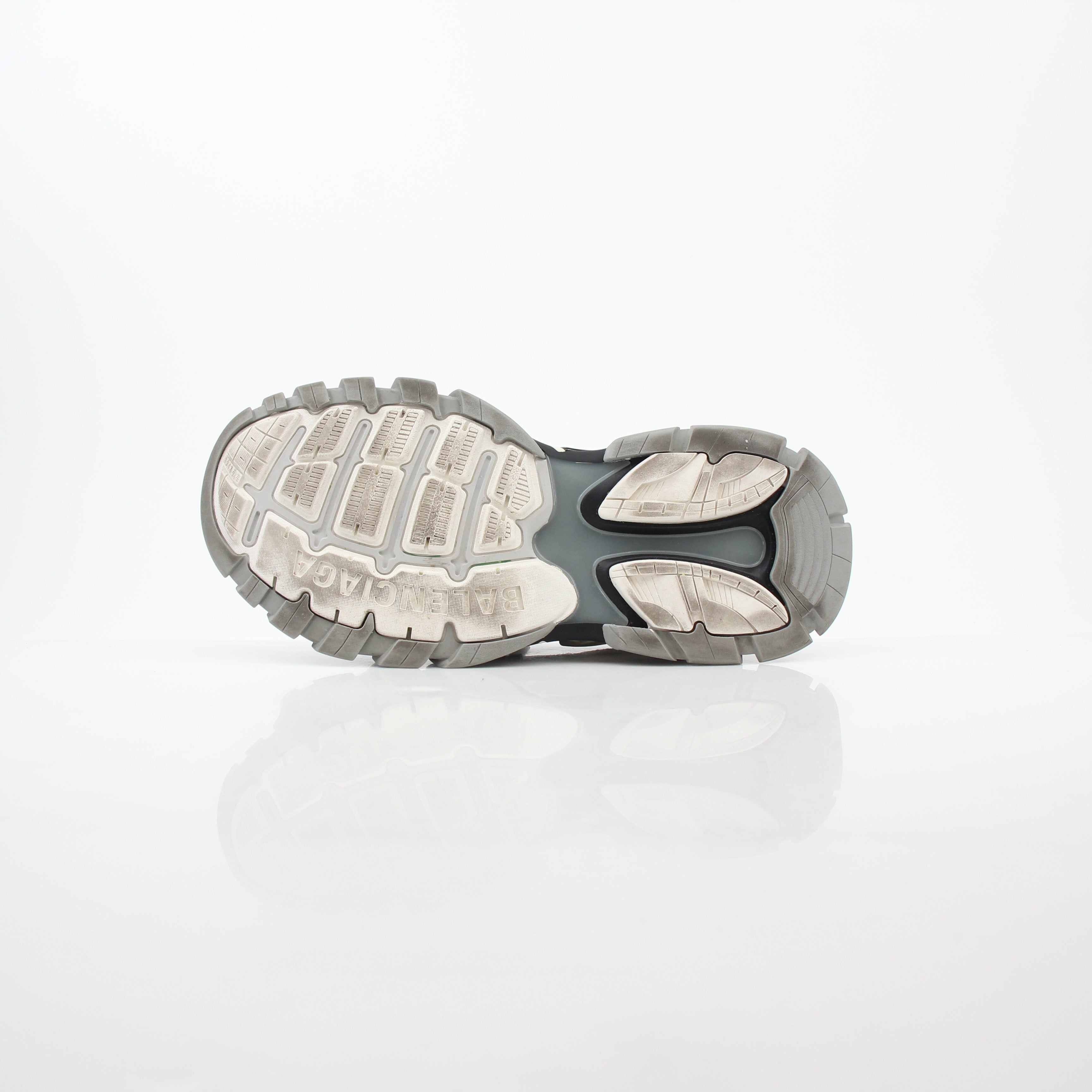 Grey Balenciaga track sandals by Gold & Beyond featuring sporty design and chunky sole, shown on a clean background.
