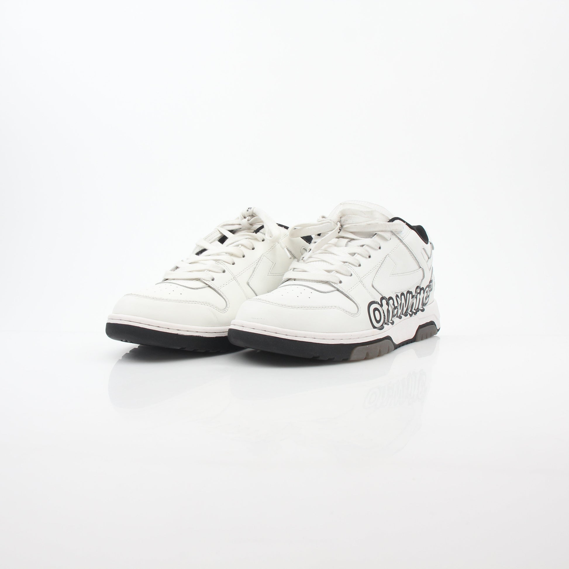 White Off-White Out Of Office graffiti logo sneakers featuring stylish design and brand detailing, displayed on a plain background.