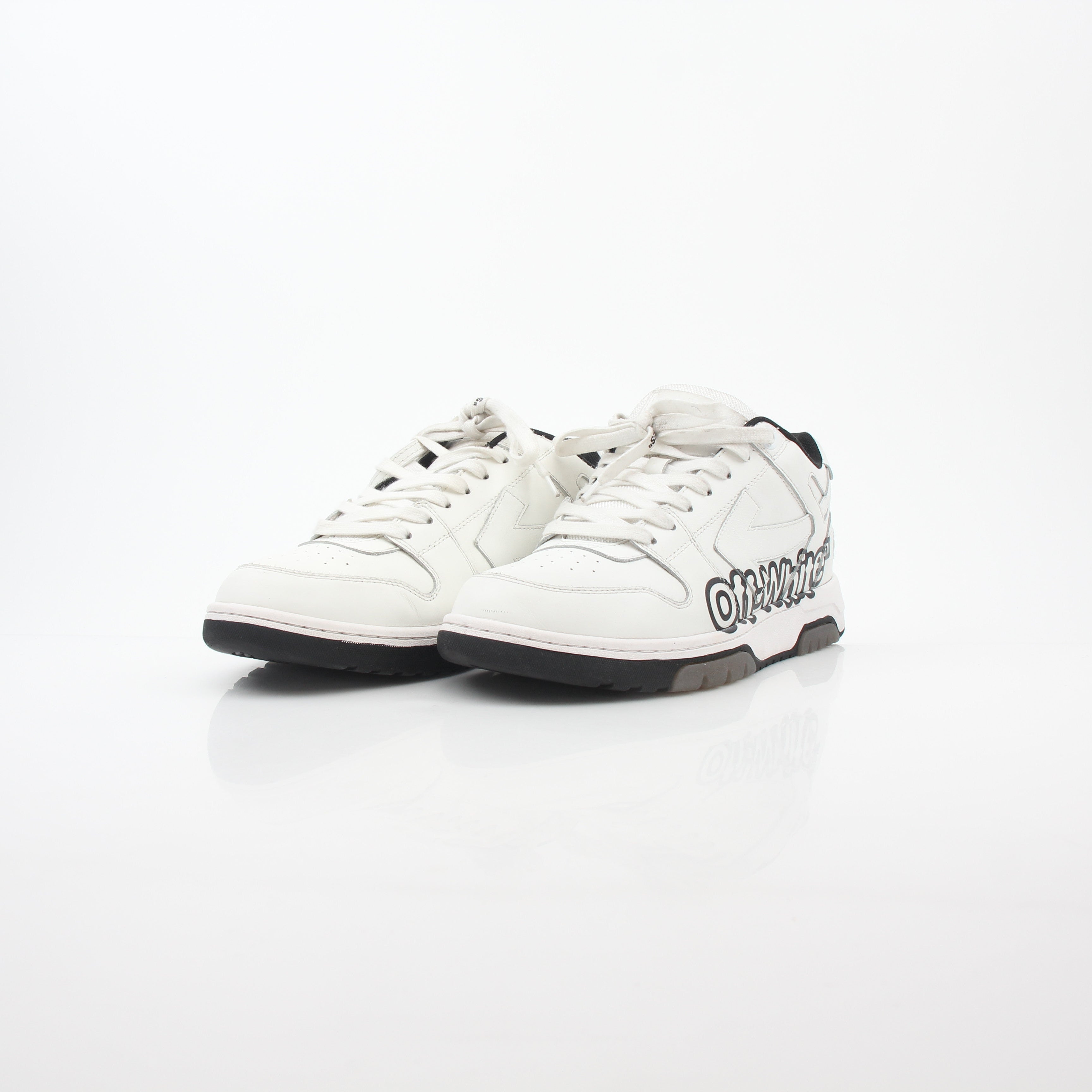 White Off-White Out Of Office graffiti logo sneakers featuring stylish design and brand detailing, displayed on a plain background.