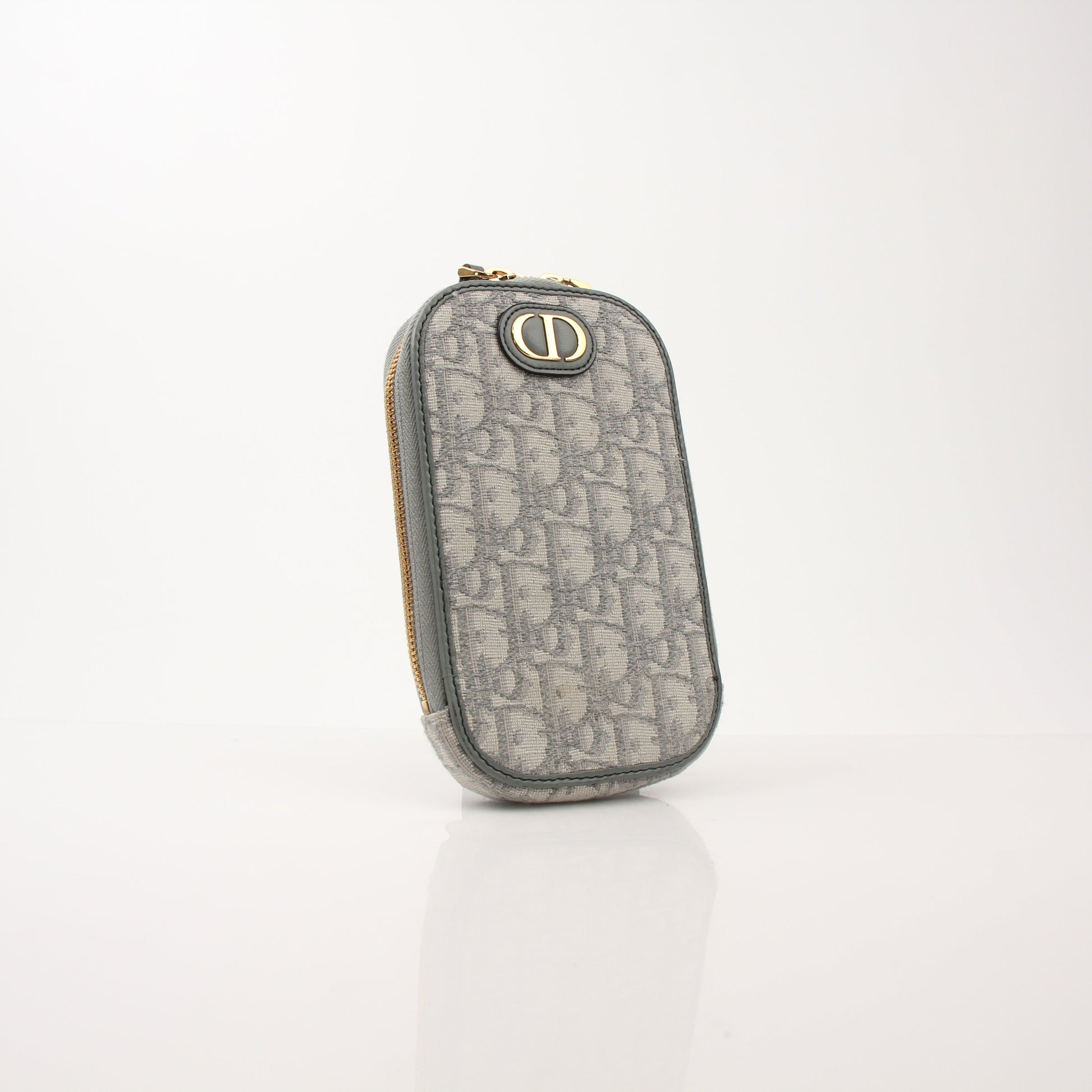 Christian Dior 30 Montaigne Call’in Dior phone holder handbag with gold accents and sleek design.
