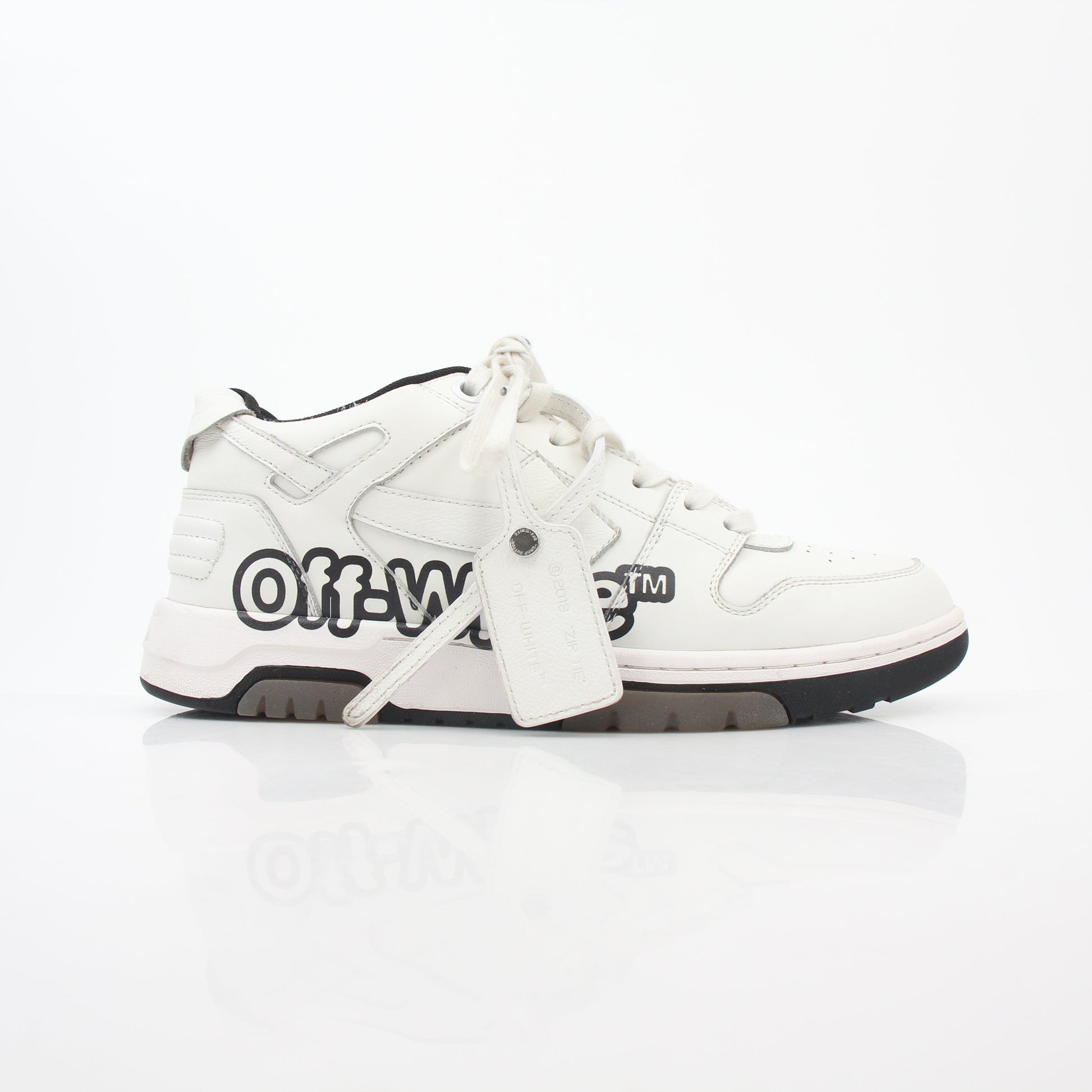 White Off-White Out Of Office graffiti logo sneakers with gold accents and classic sneaker design from Gold & Beyond.