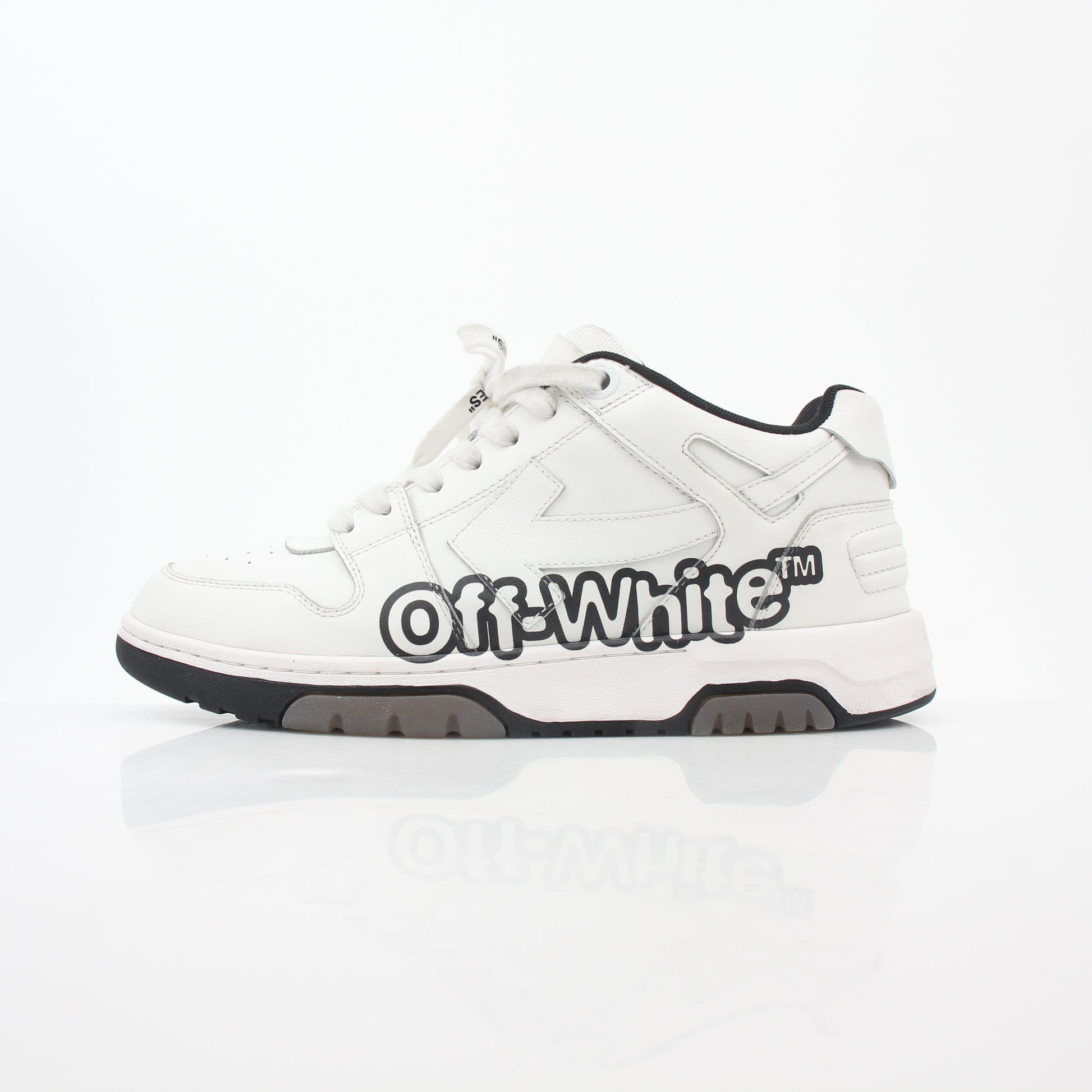 Off-White White Out Of Office graffiti logo sneakers with white and black design and stylish branding, displayed from a front angle.