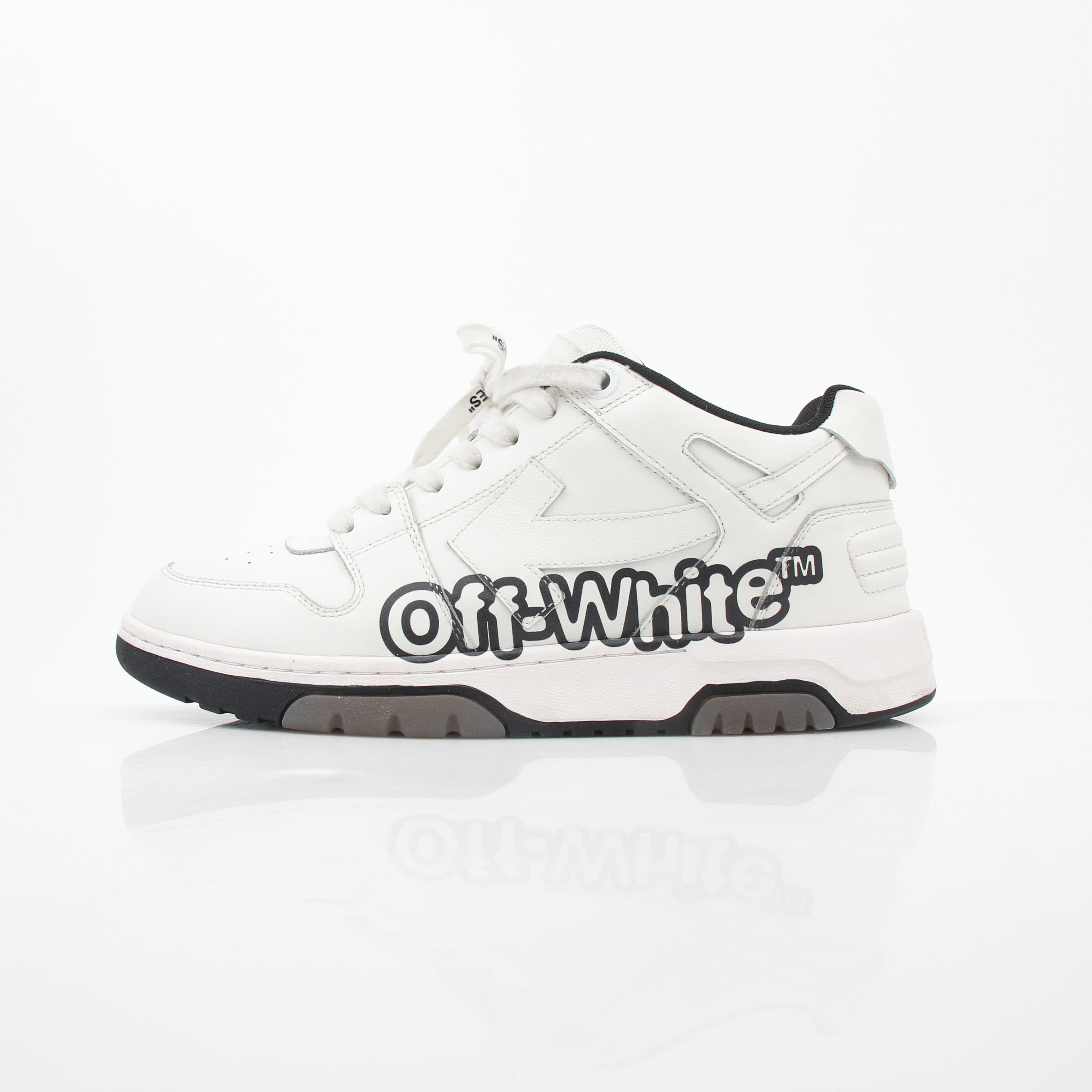Off-White White Out Of Office graffiti logo sneakers with white and black design and stylish branding, displayed from a front angle.