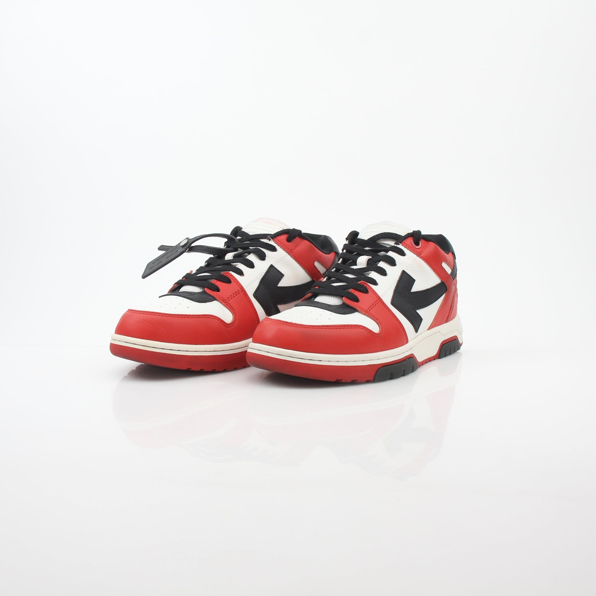 Off-White Out Of Office sneakers in red, white, and black with stylish design, displayed on a plain background.