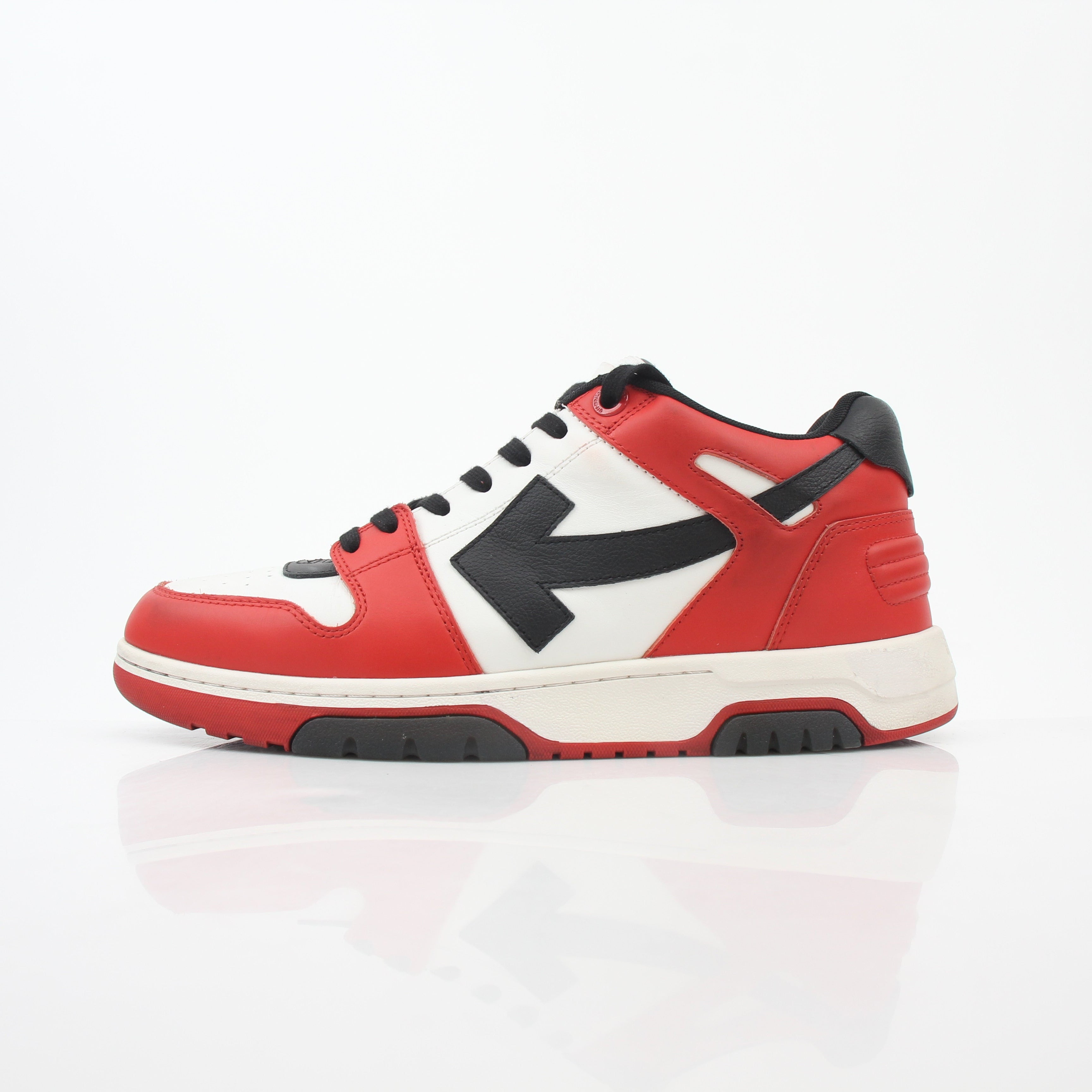 Off-White Out Of Office sneakers in red, white, and black featuring bold branding and stylish design, worn as casual shoes.