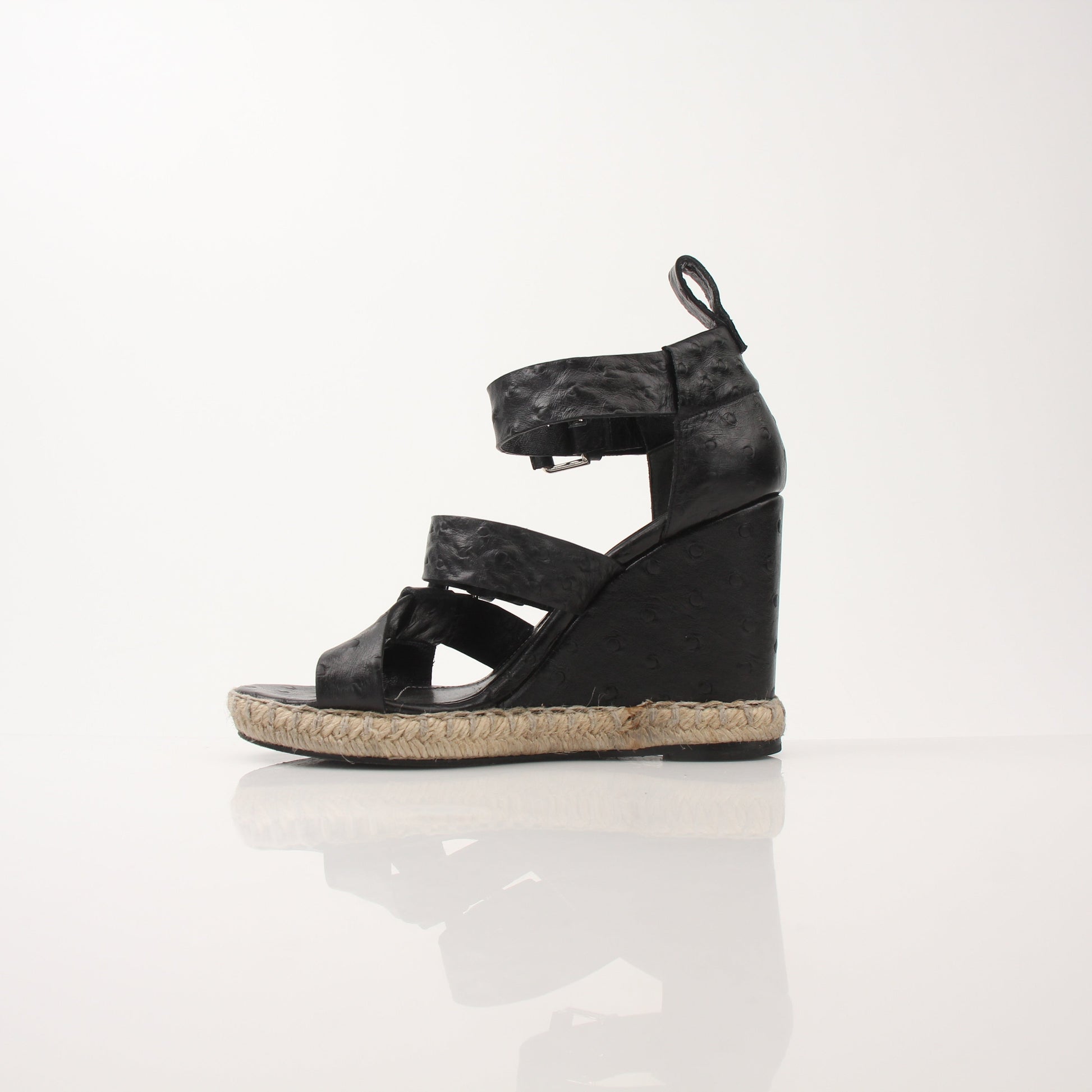 Gold & Beyond Balenciaga Ostrich Wedge Espadrille Sandals with beige ostrich leather uppers and woven jute wedge soles.