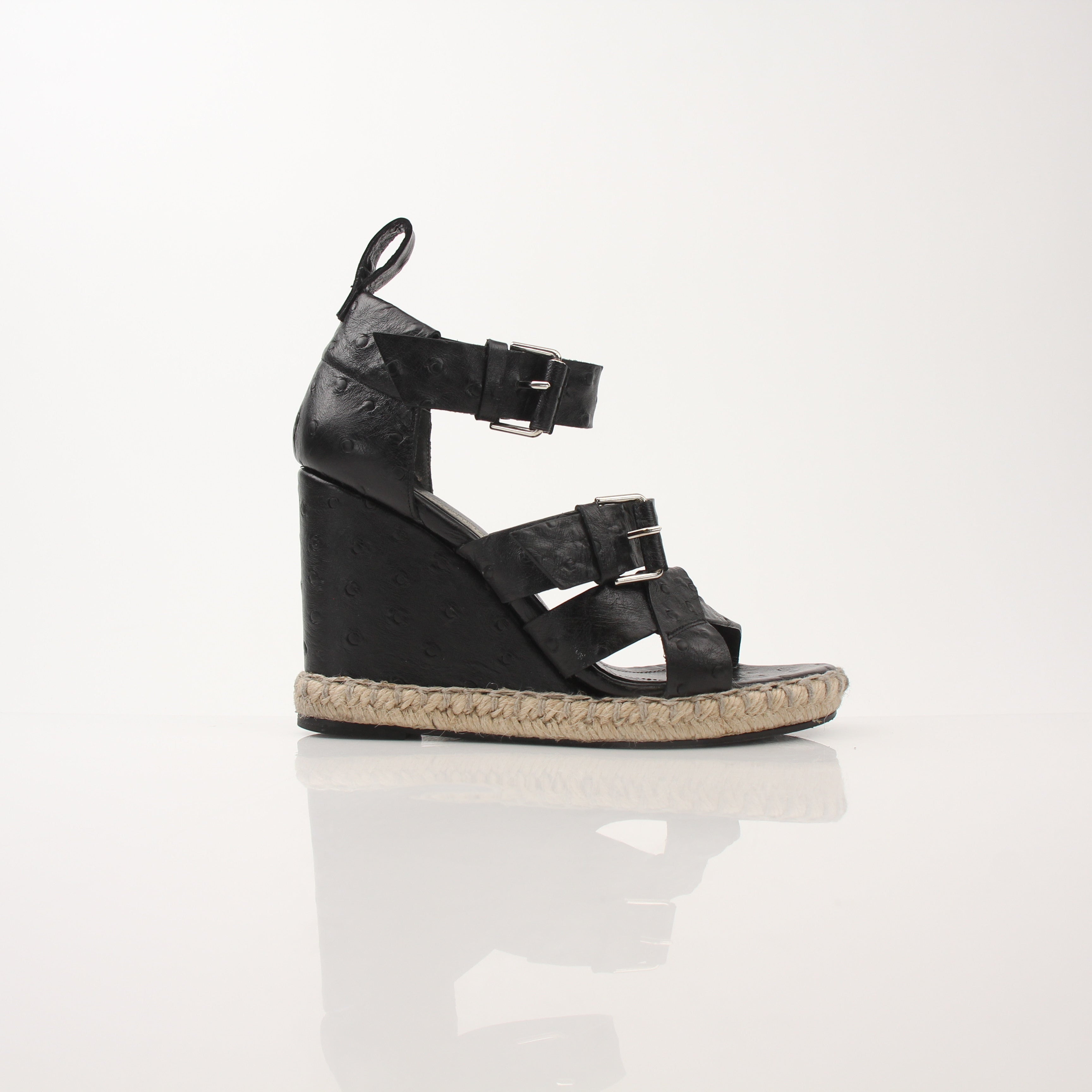 Gold & Beyond Balenciaga ostrich wedge espadrille sandals with ankle straps and woven jute soles, stylish and luxurious footwear.