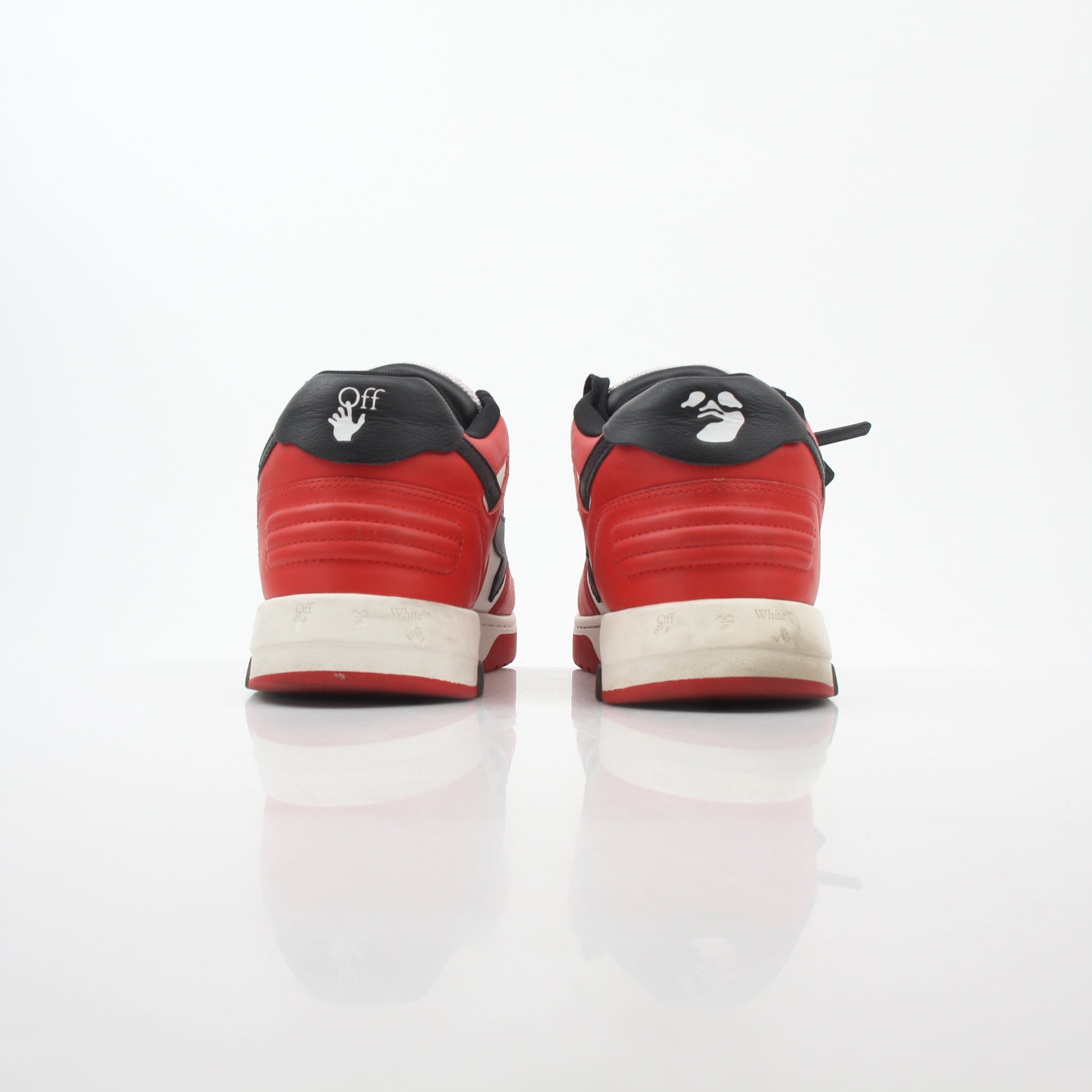 Off-White Out Of Office sneakers in red, white, and black with stylish design, displayed on a neutral background.