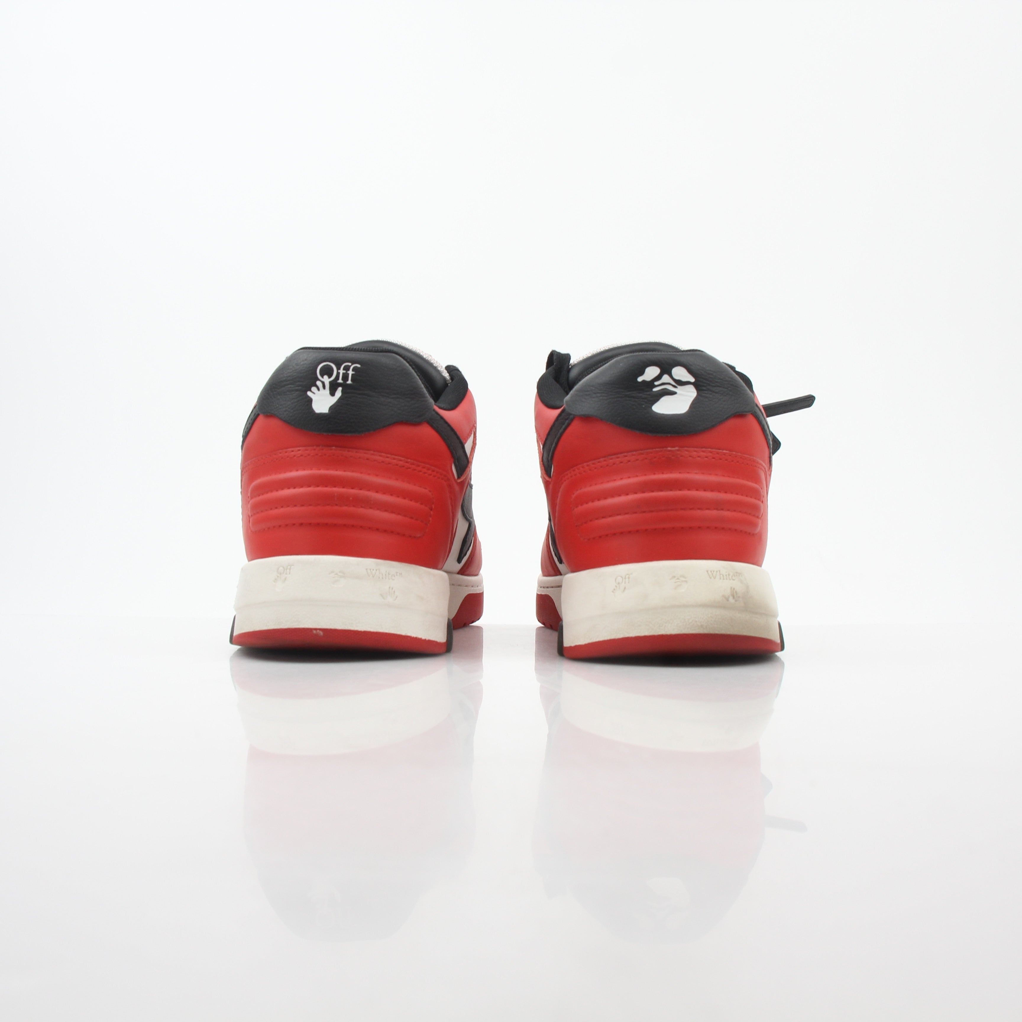 Off-White Out Of Office sneakers in red, white, and black with stylish design, displayed on a neutral background.