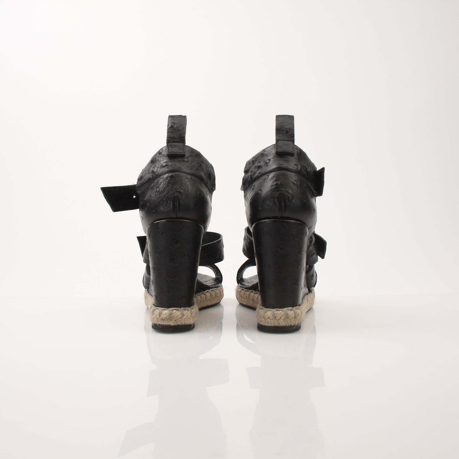 Gold & Beyond Balenciaga Ostrich Wedge Espadrille Sandals featuring black ostrich leather and woven espadrille wedge heel.