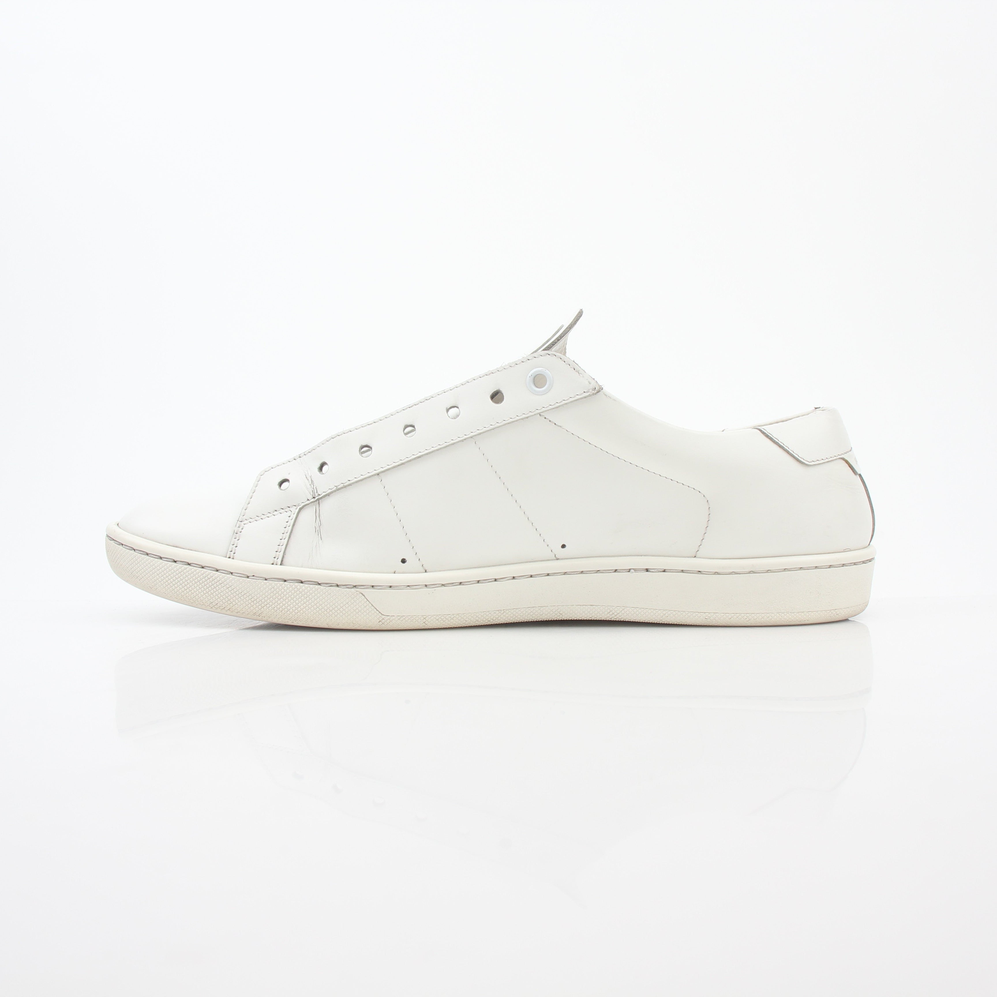White Saint Laurent SL/06 Court Classic sneakers, stylish leather shoes with gold accents from Gold & Beyond.