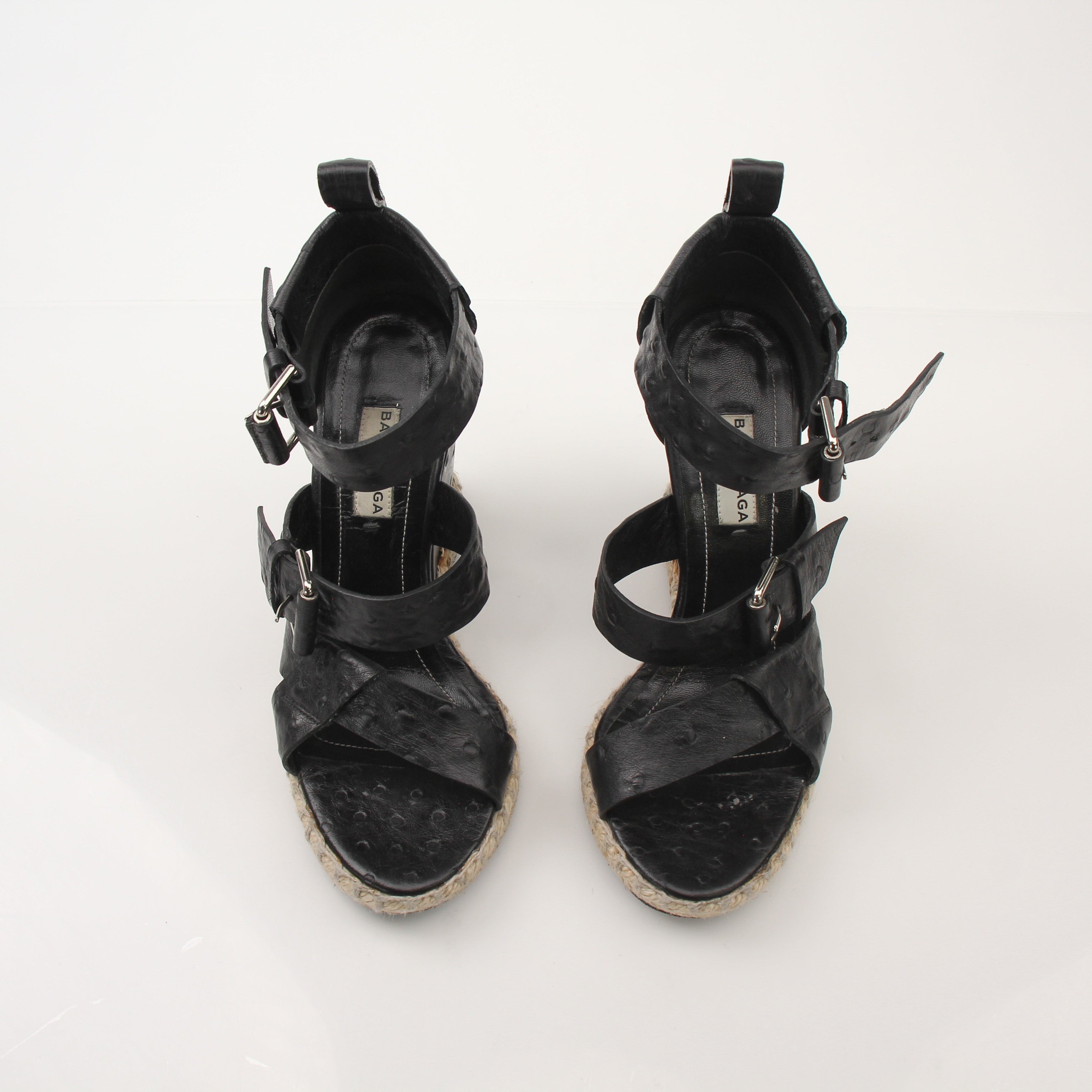 Gold & Beyond Balenciaga ostrich wedge espadrille sandals featuring luxurious ostrich leather and woven jute wedge heel.