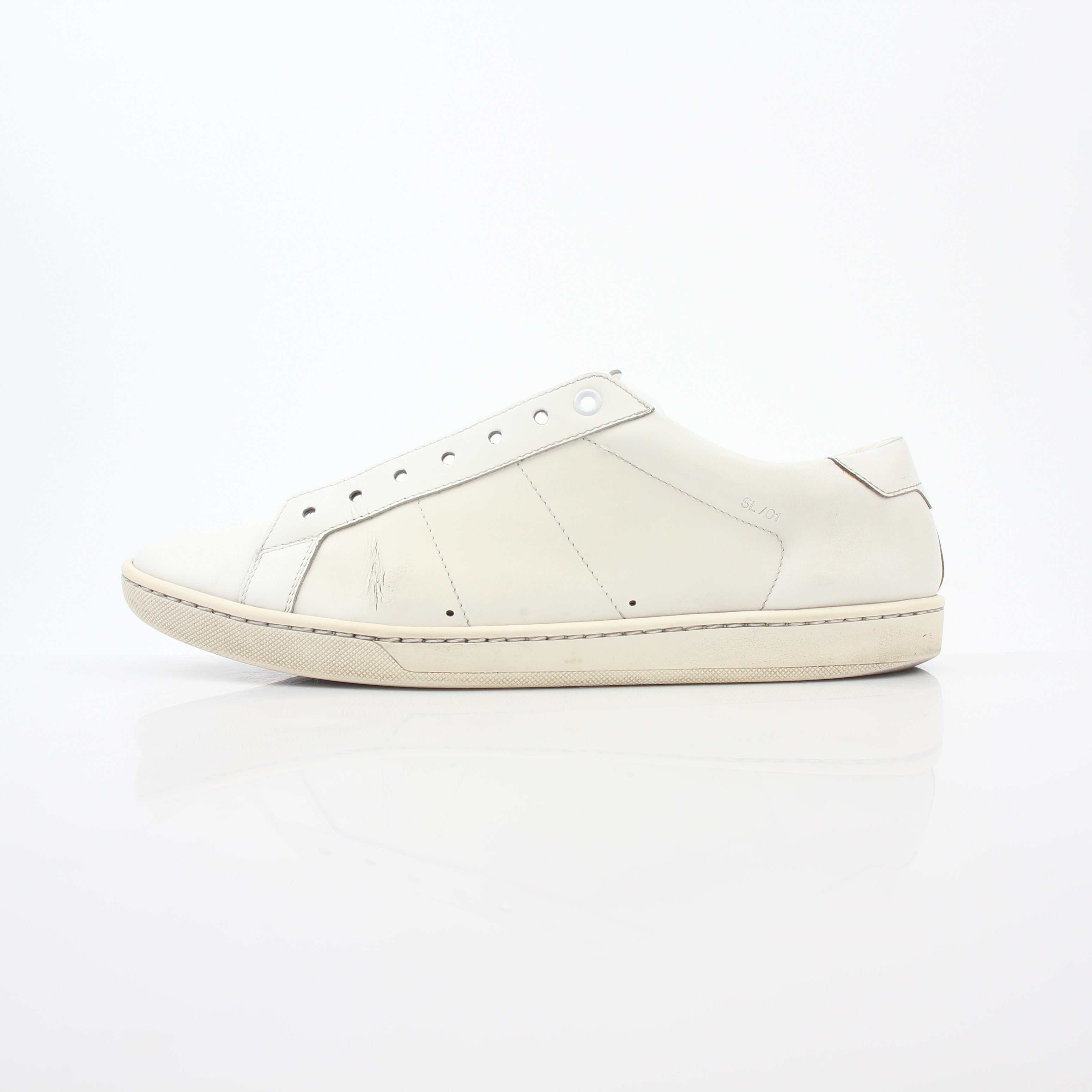 White Saint Laurent SL/06 Court Classic sneakers with gold accents, stylish shoes from Gold & Beyond, shown on clean background.