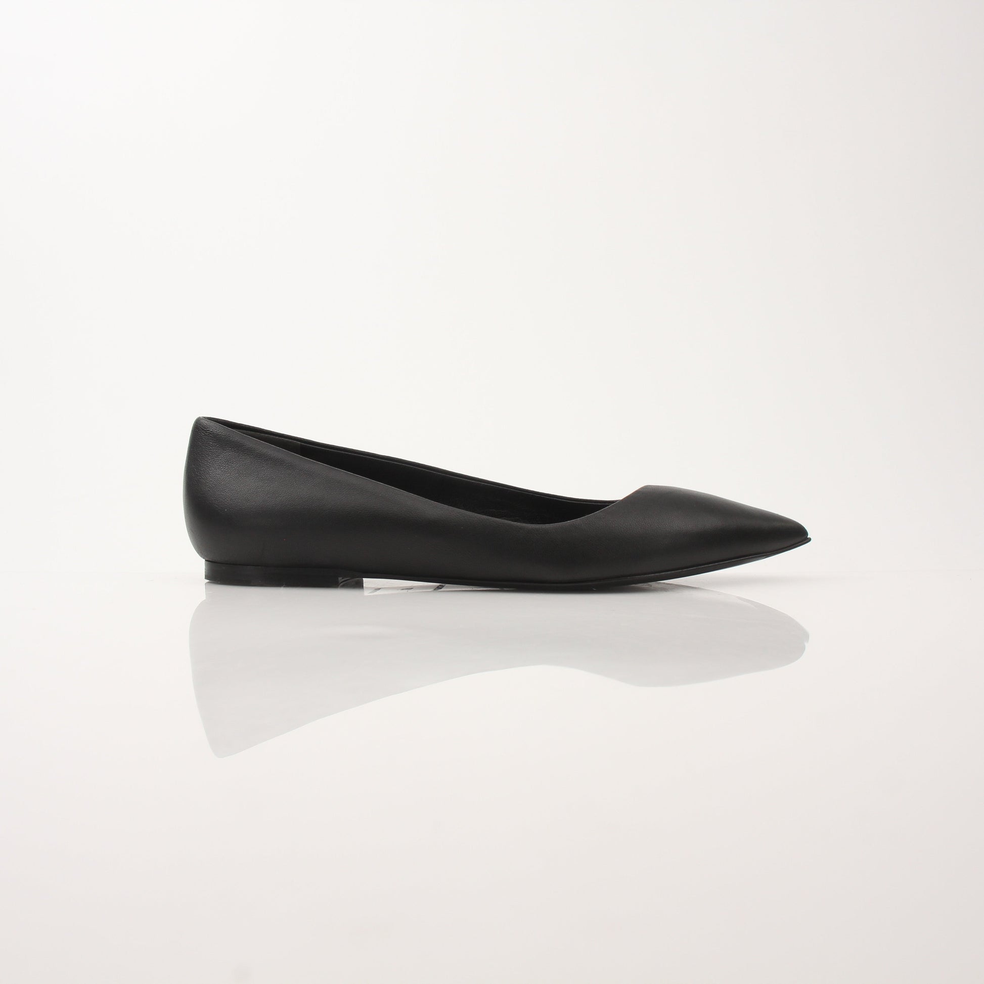 Gold & Beyond leather Balenciaga pointed-toe flats, stylish shoes with sleek design and elegant craftsmanship.