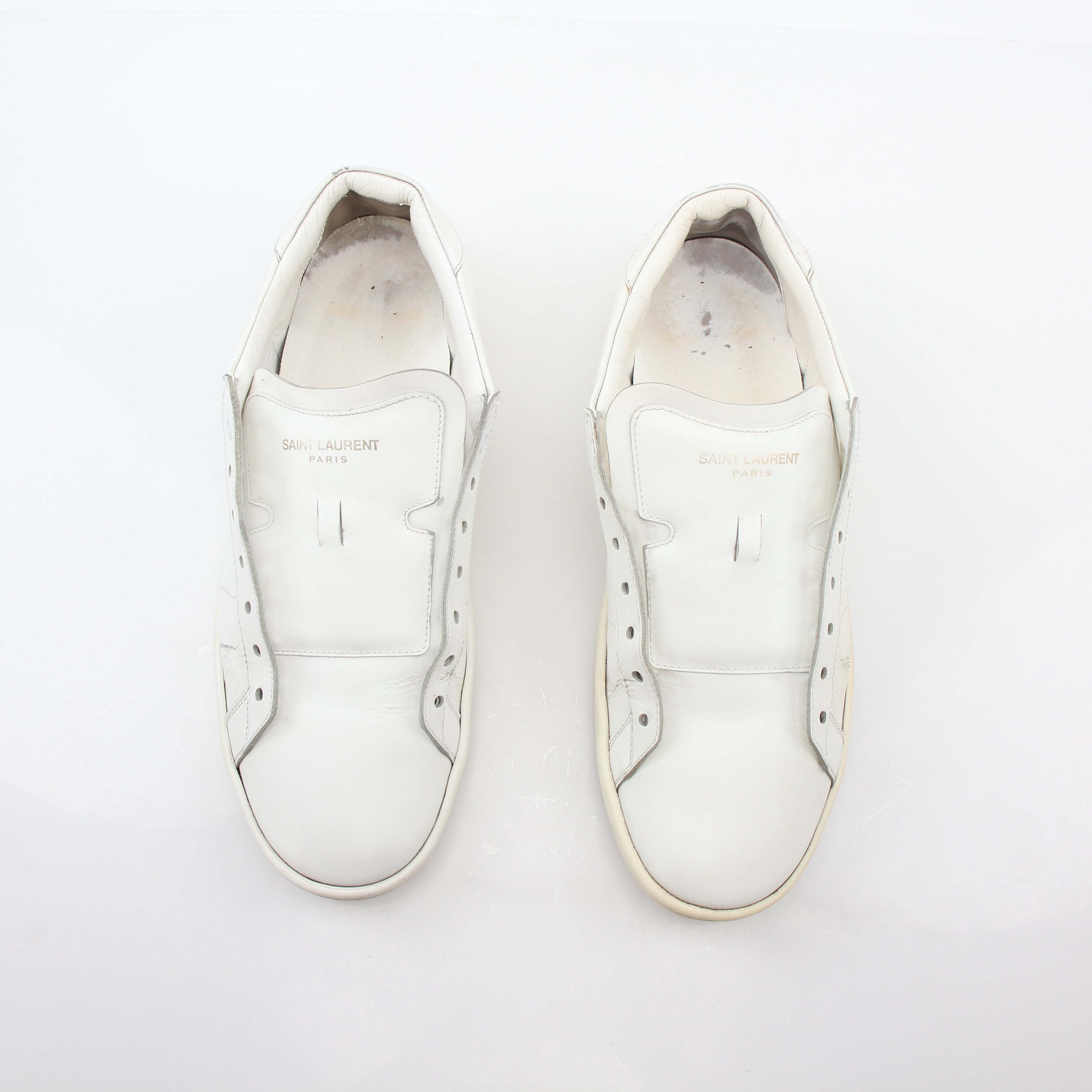 Gold & Beyond Saint Laurent White SL/06 Court Classic Sneakers shown with clean white leather and classic lace-up design.