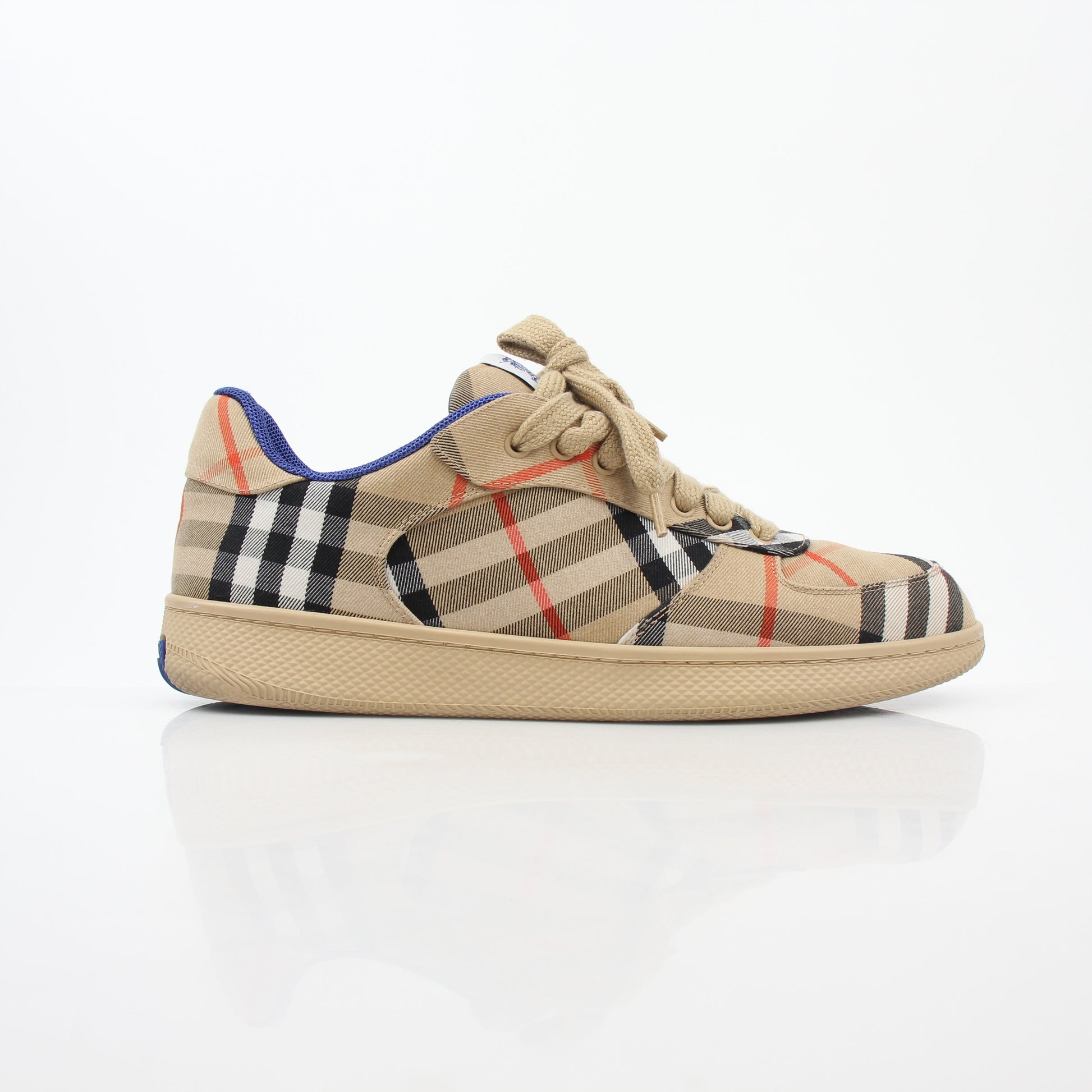 Gold & Beyond Burberry Vintage Check Terrace low-top sneakers with beige and black check pattern and white rubber soles.