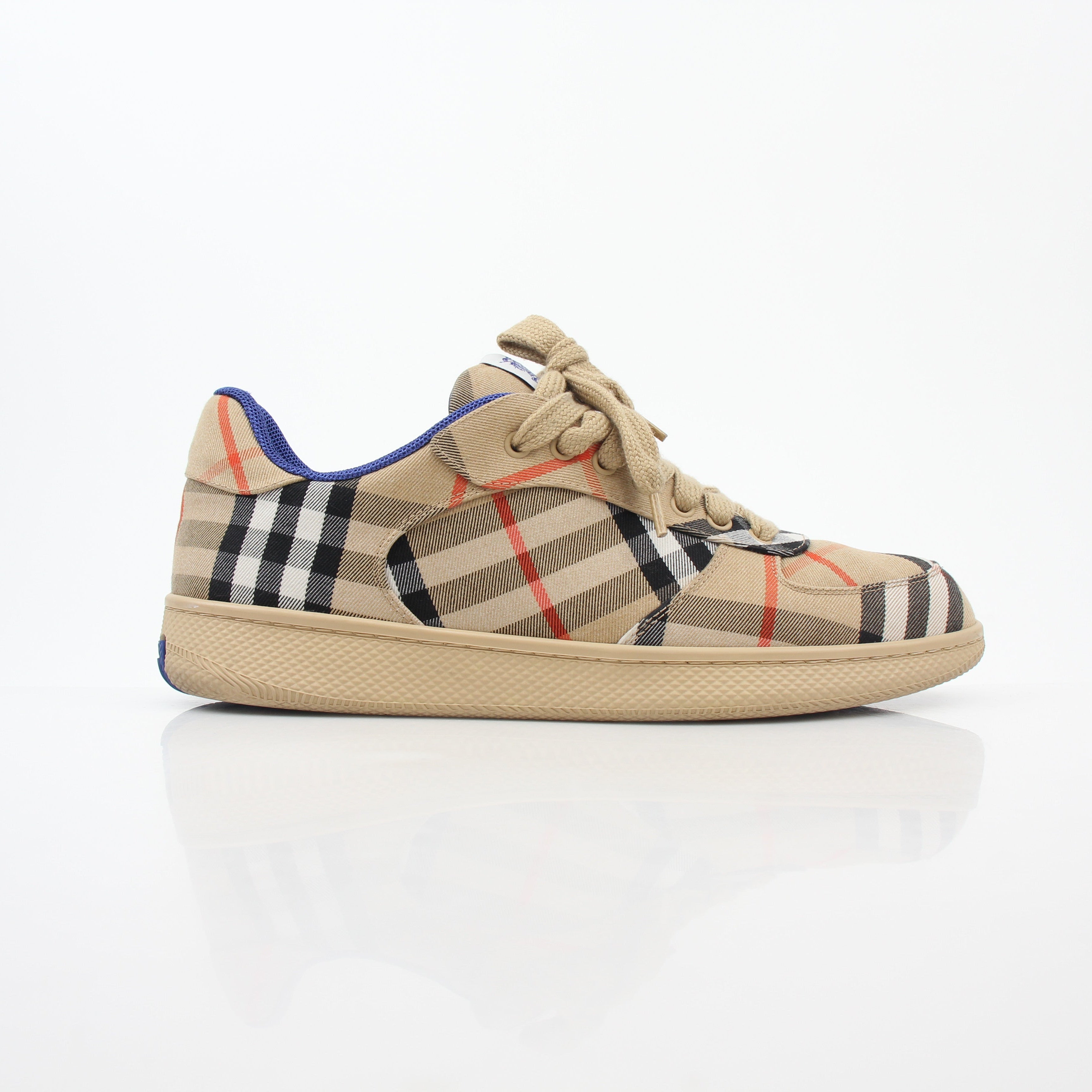 Gold & Beyond Burberry Vintage Check Terrace low-top sneakers with beige and black check pattern and white rubber soles.