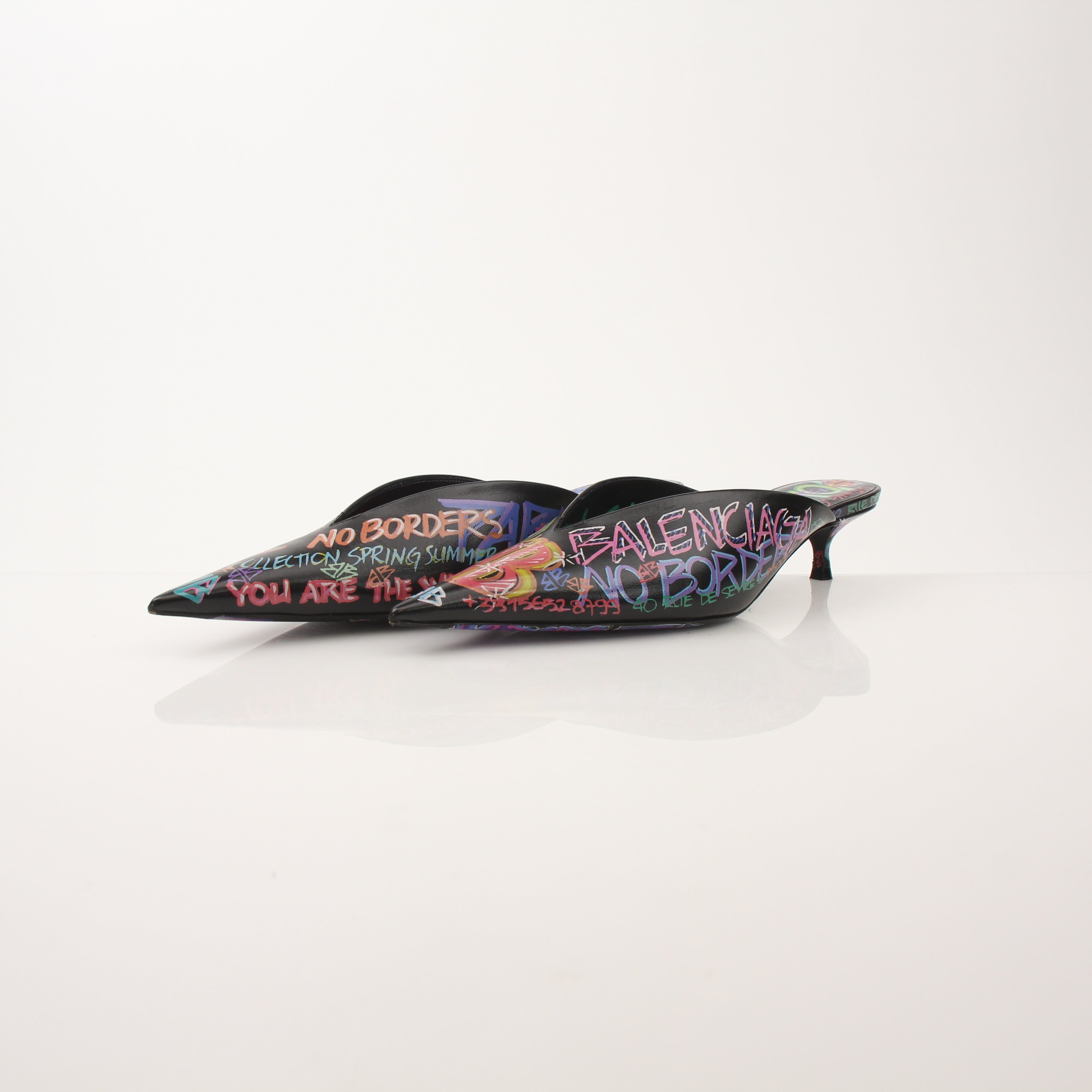 Gold & Beyond Balenciaga Graffiti Knife Mules heels with bold graffiti design and pointed toe on stylish footwear.