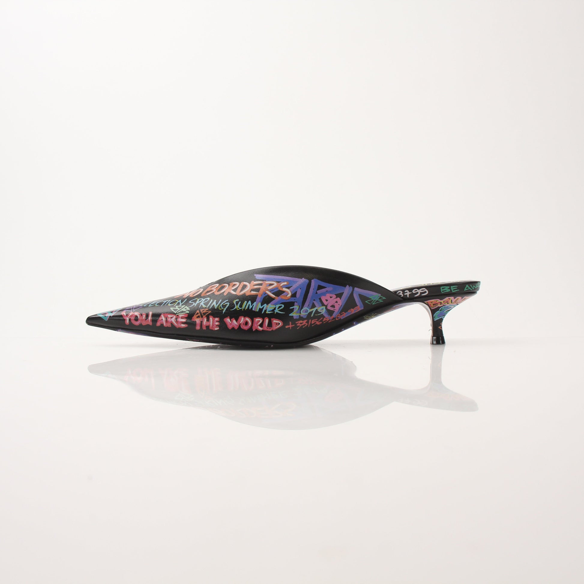Gold & Beyond Balenciaga Graffiti Knife Mules heels with bold graffiti design and sleek pointed toe, stylish and modern footwear.