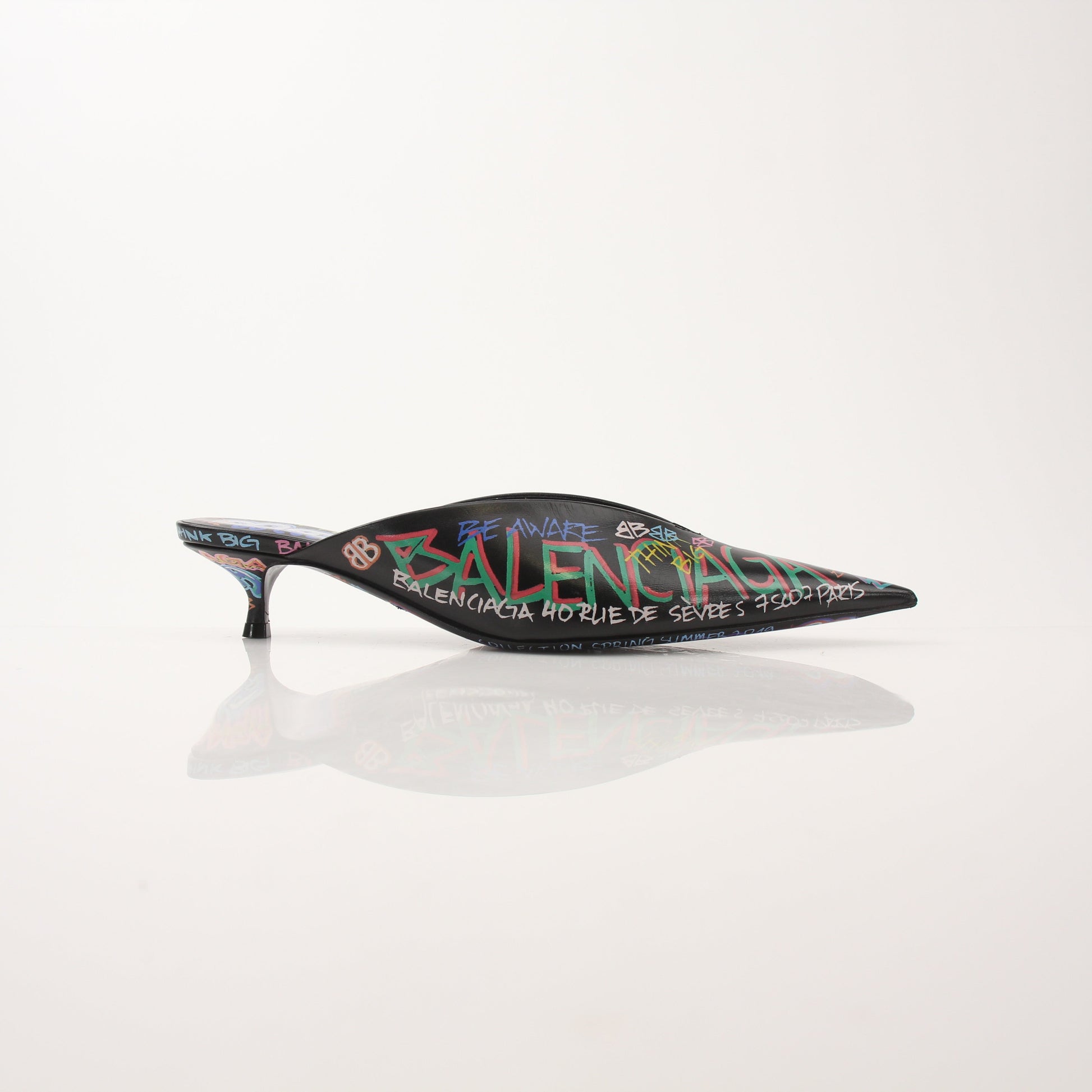 Gold & Beyond Balenciaga Graffiti Knife Mules heels with bold graffiti design and sleek pointed toes on a white background.