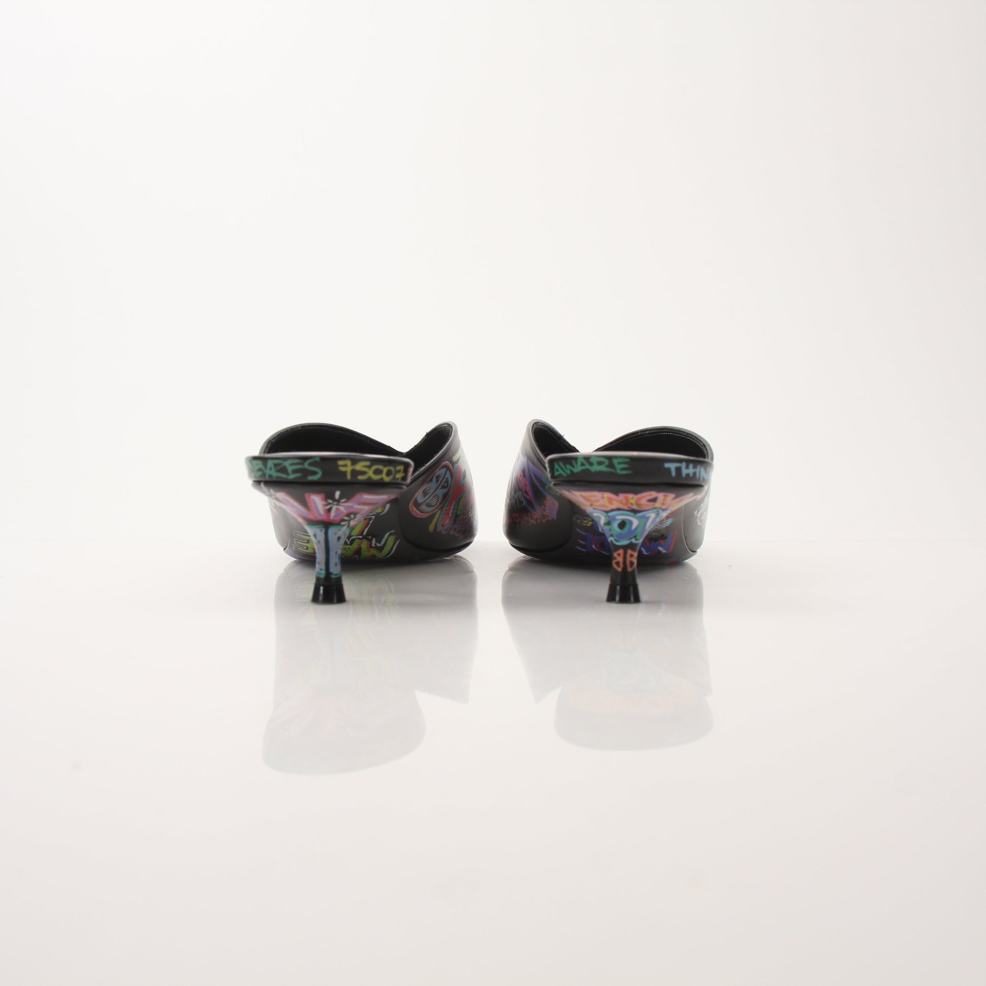 Gold & Beyond Balenciaga Graffiti Knife Mules heels with bold graffiti design and sleek silhouette on a white background.
