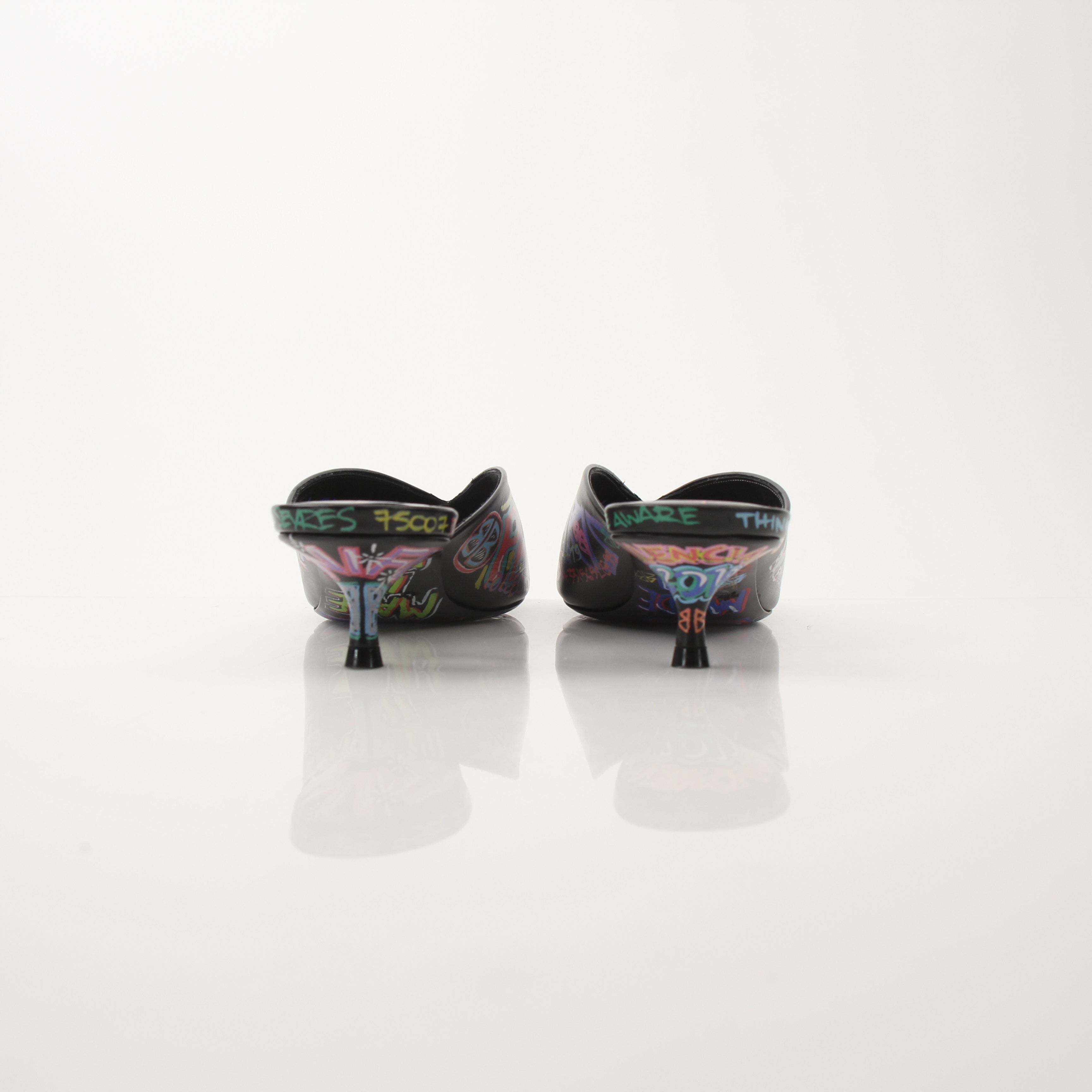 Gold & Beyond Balenciaga Graffiti Knife Mules heels with bold graffiti design and sleek silhouette on a white background.