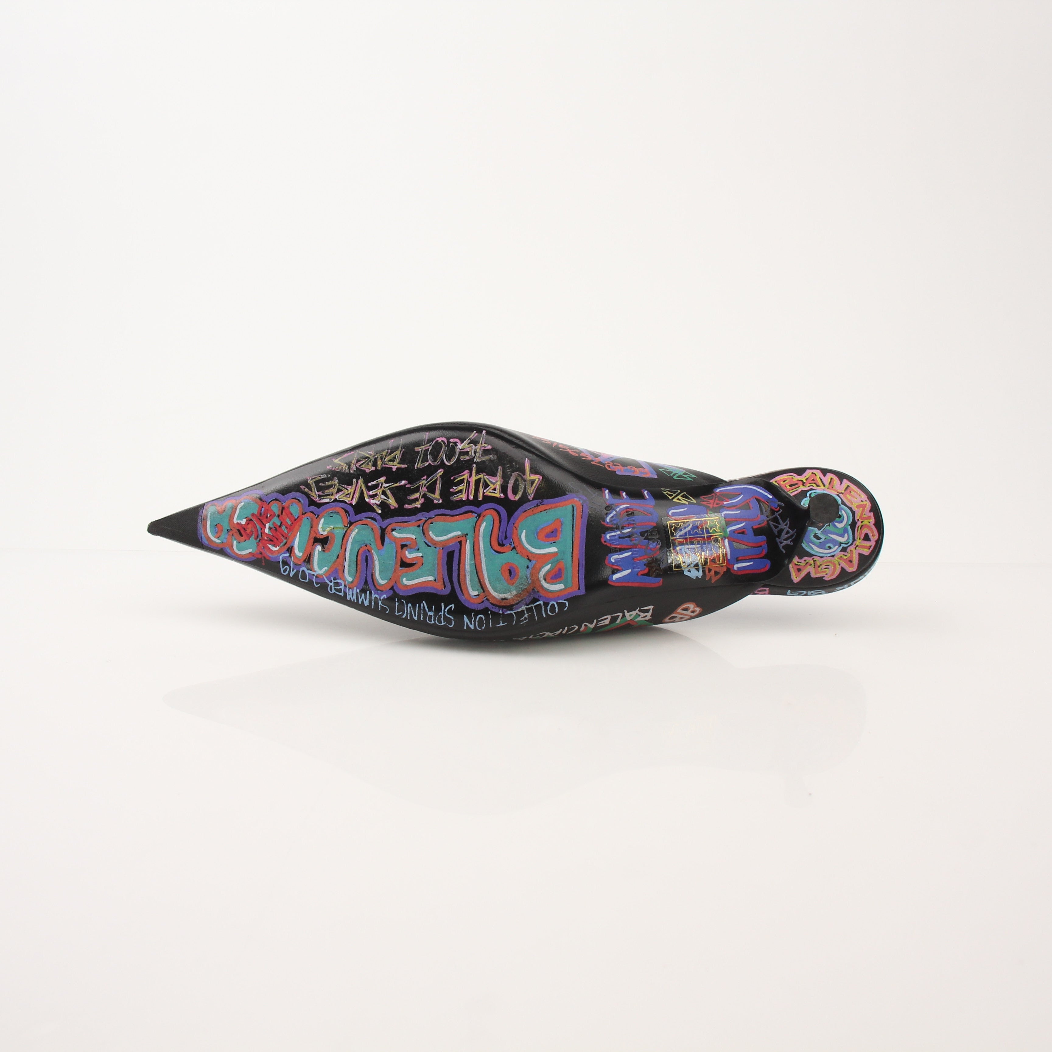Gold & Beyond Balenciaga Graffiti Knife Mules heels with vibrant graffiti design and pointed toe, stylish and modern footwear.