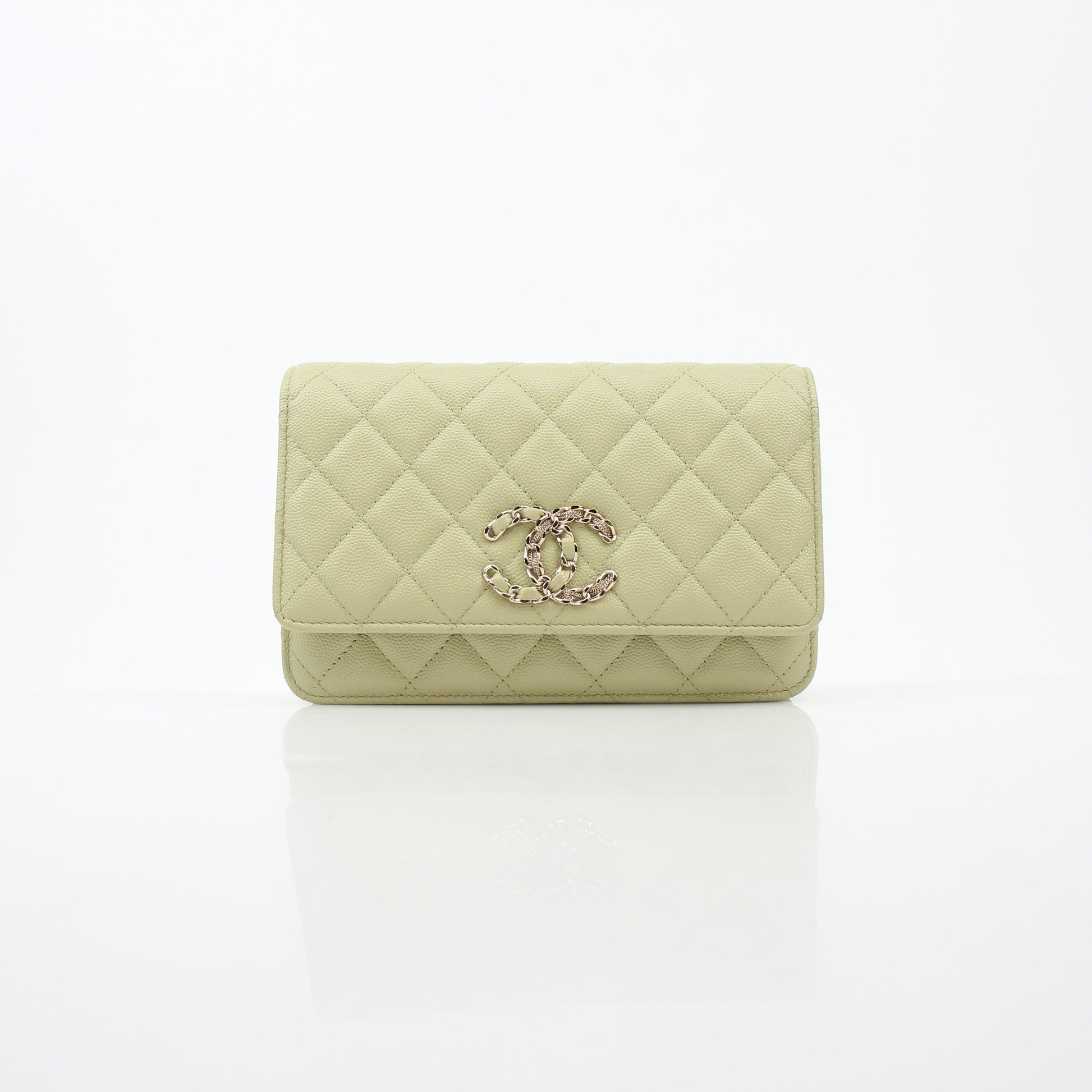 Light green Chanel Caviar French New Wave Chain CC wallet on chain handbag with gold hardware and signature quilting.