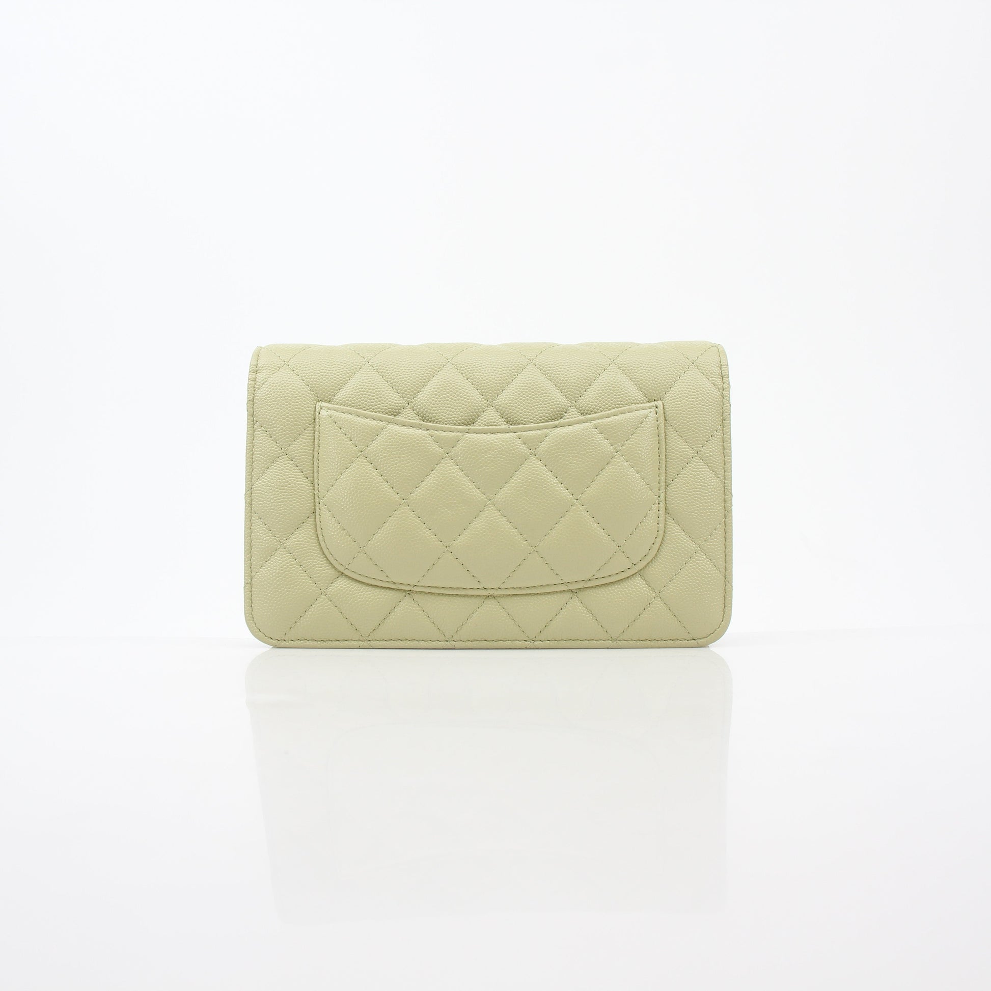 Light green Chanel Caviar French New Wave Chain CC wallet on chain handbag with gold accents, featuring a classic luxury design.