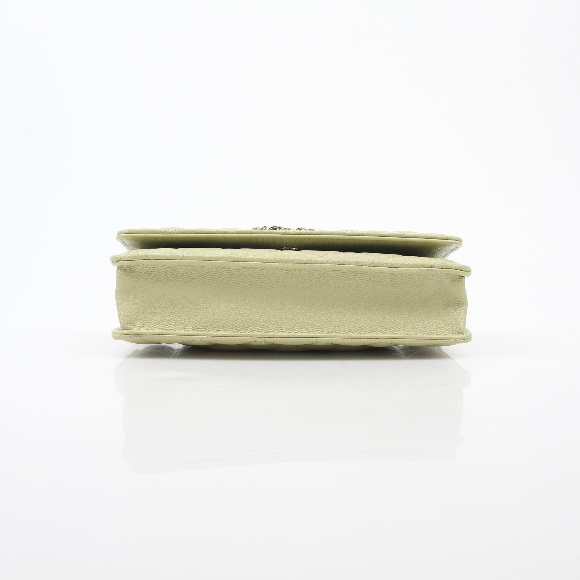 Light green Chanel caviar leather French New Wave chain CC wallet on chain handbag with gold hardware and chain strap.