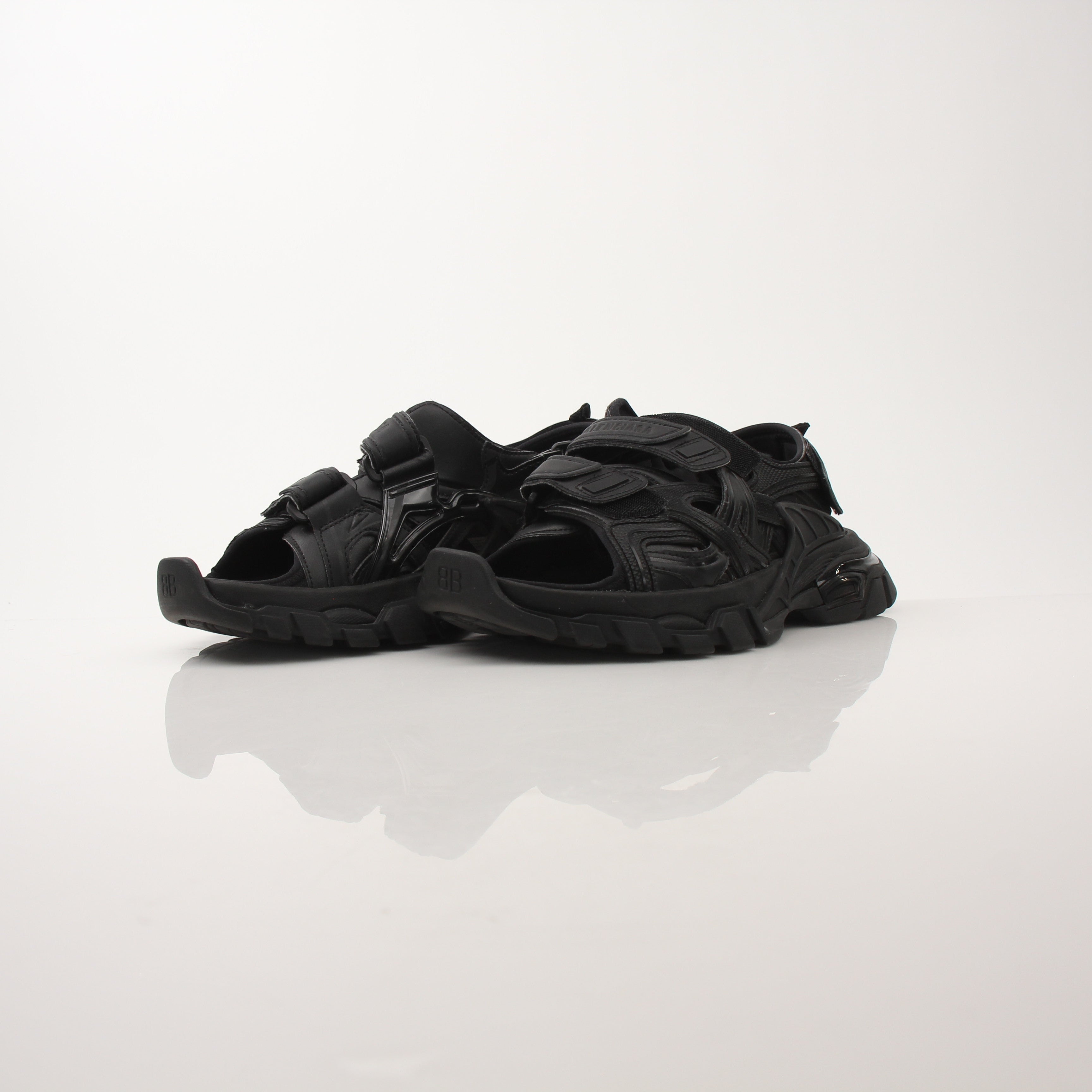 Gold & Beyond women's Balenciaga track sandals with sleek design and sporty style, featuring open toes and adjustable straps.