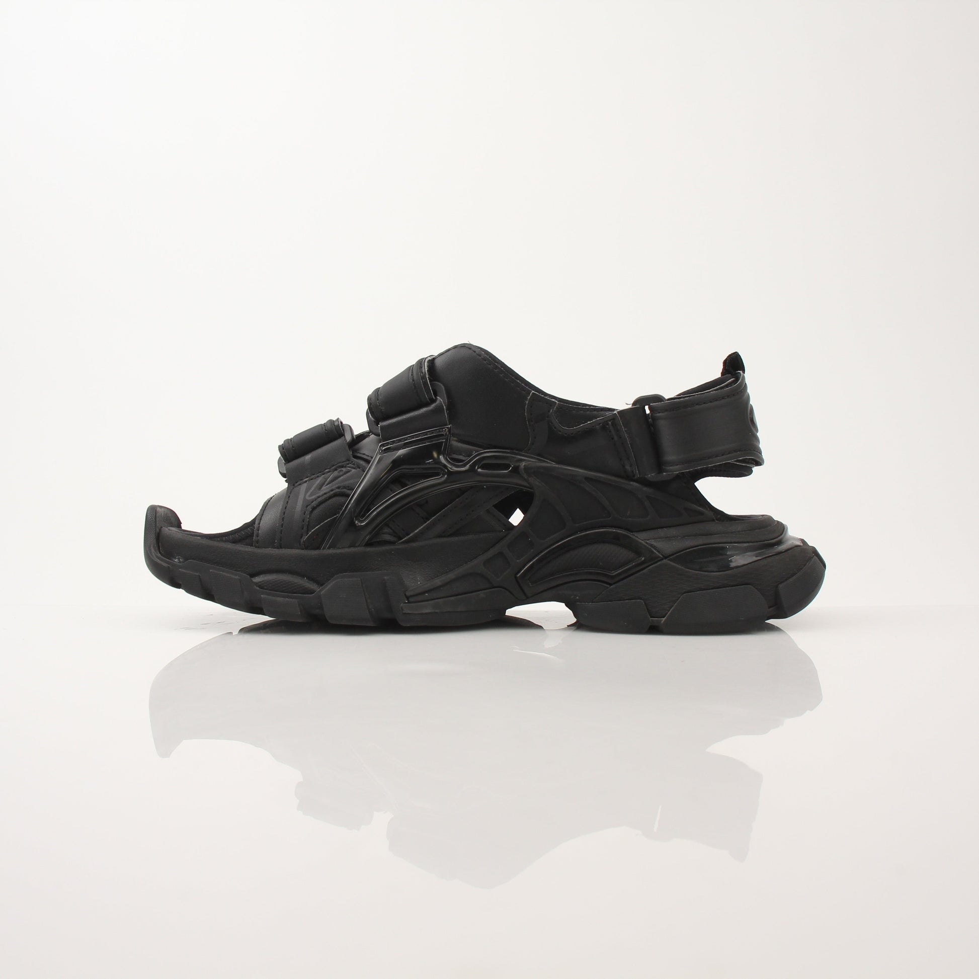 Gold & Beyond women's Balenciaga track sandals, stylish shoes with sporty design, featuring sleek straps and chunky sole.