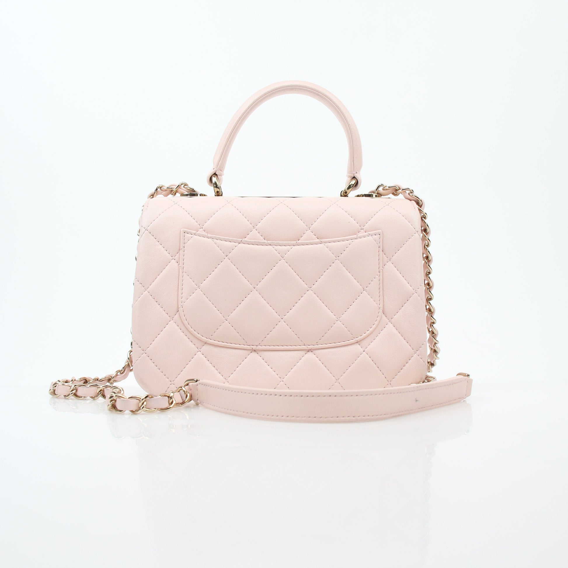 Gold & Beyond pink Chanel small CC flap handbag with top handle, trendy designer purse with gold accents and classic quilted pattern.