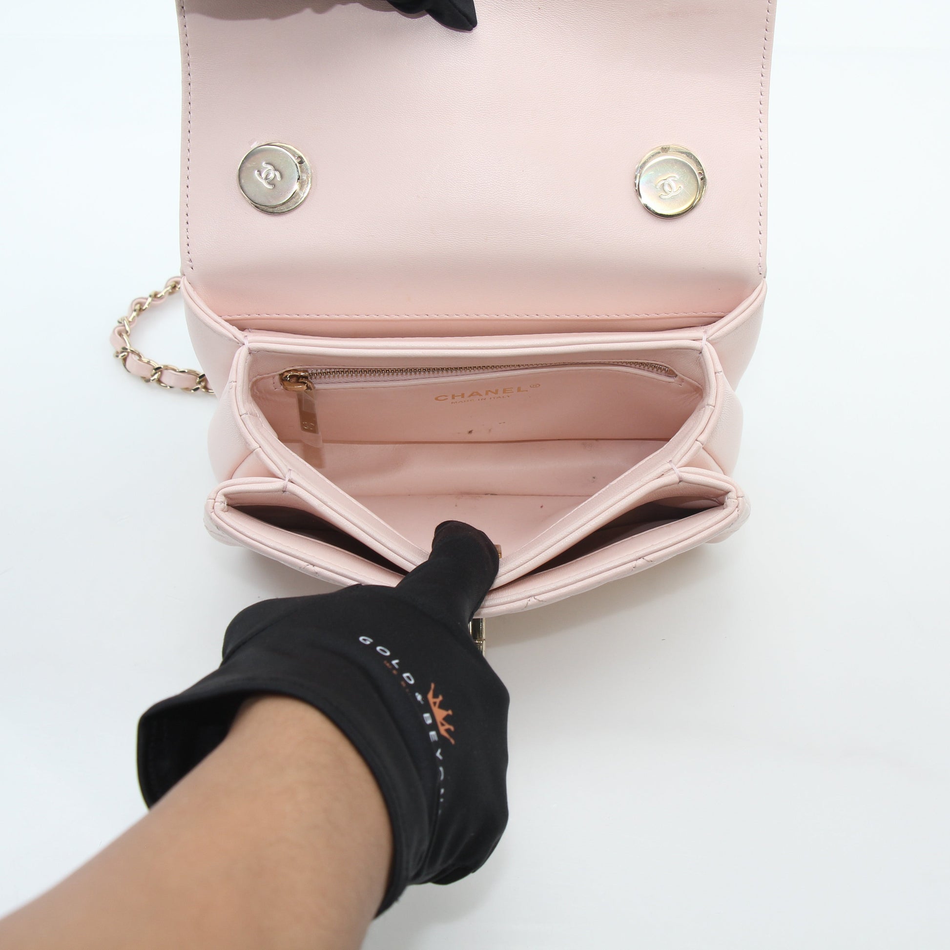Gold & Beyond pink Chanel small CC flap handbag with top handle, trendy designer handbag with gold hardware.