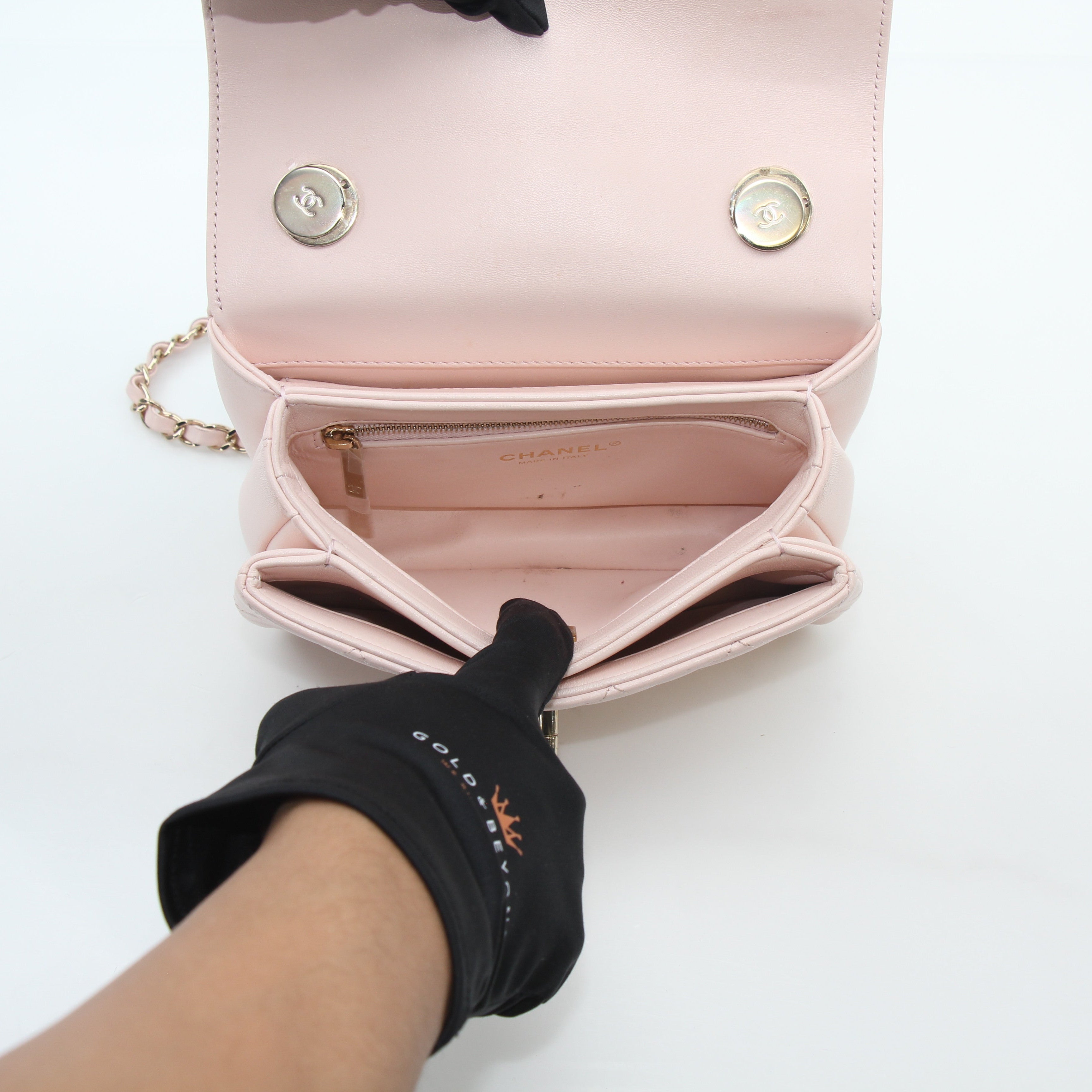 Gold & Beyond pink Chanel small CC flap handbag with top handle, trendy designer handbag with gold hardware.