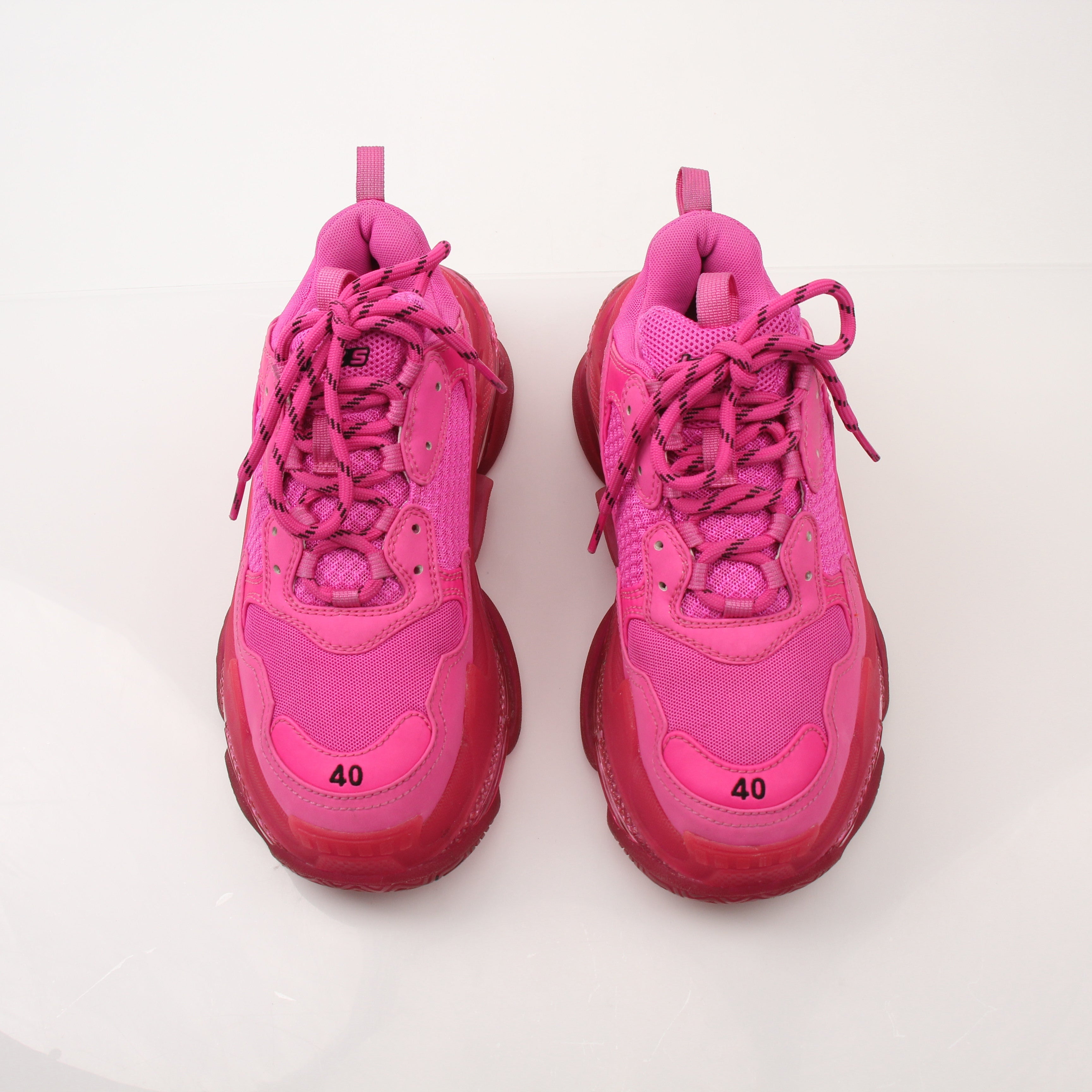 Gold & Beyond men's Balenciaga Triple S sneakers, stylish shoes with chunky design and detailed craftsmanship.