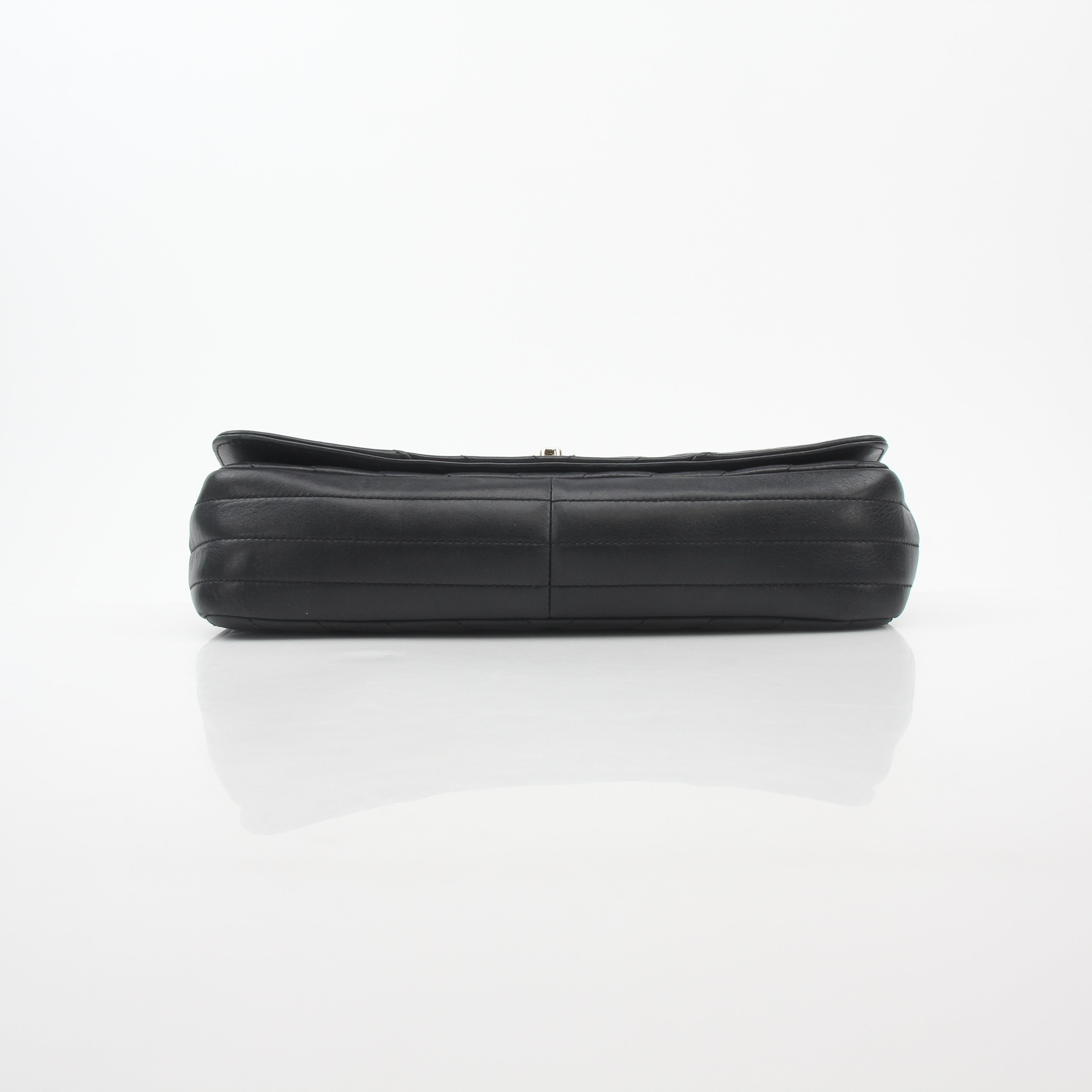 Black Chanel Chevron Flap Handbag with gold chain strap and quilted leather detailing.