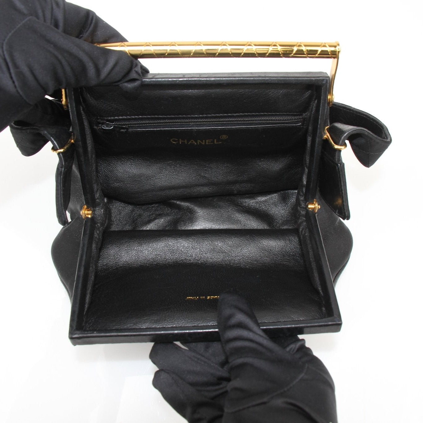 Chanel black classic shoulder handbag with gold hardware, featuring quilted leather and chain strap, stylish and elegant accessory.