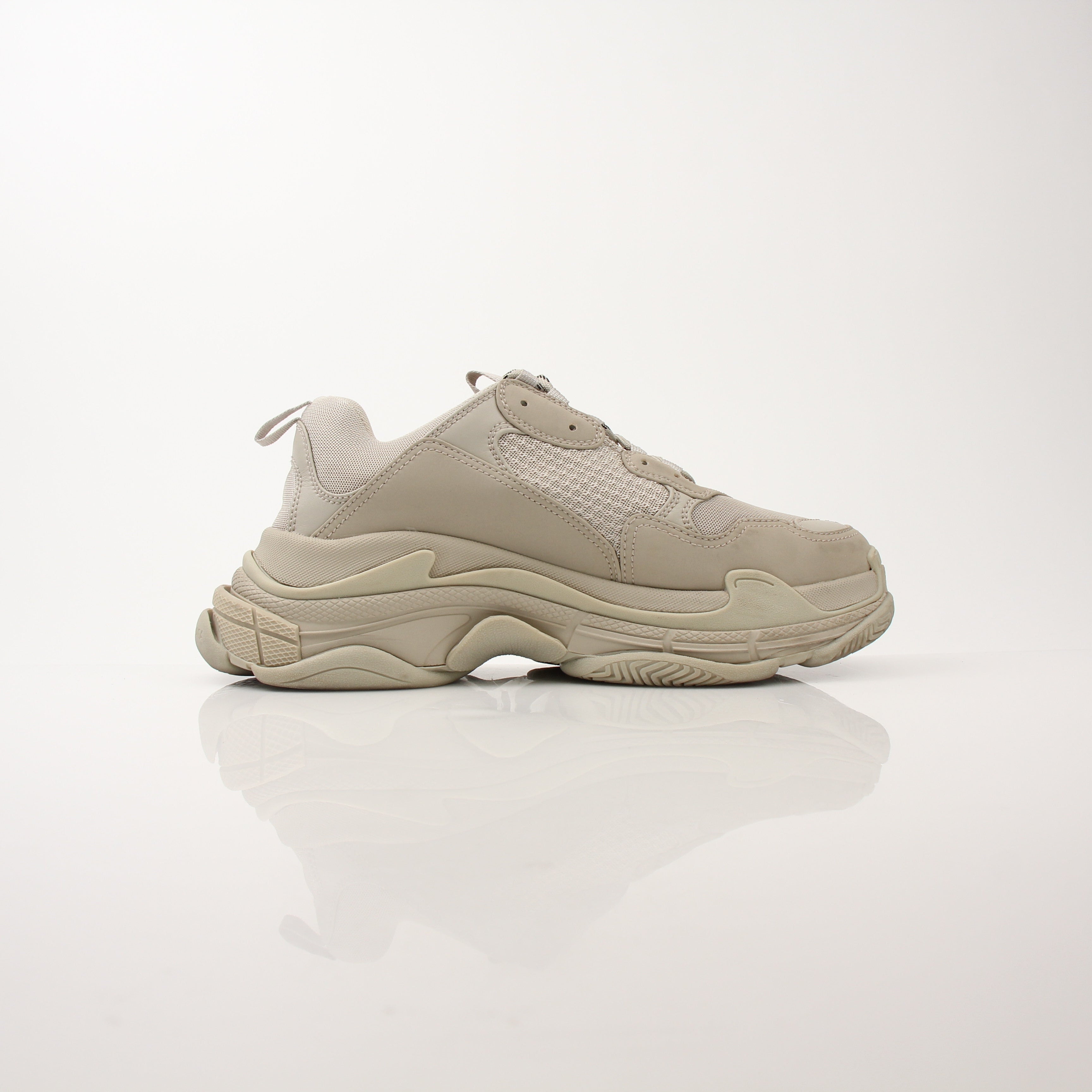 Gold & Beyond men's Balenciaga Triple S sneakers, stylish shoes with chunky design and mixed-materials, front view.