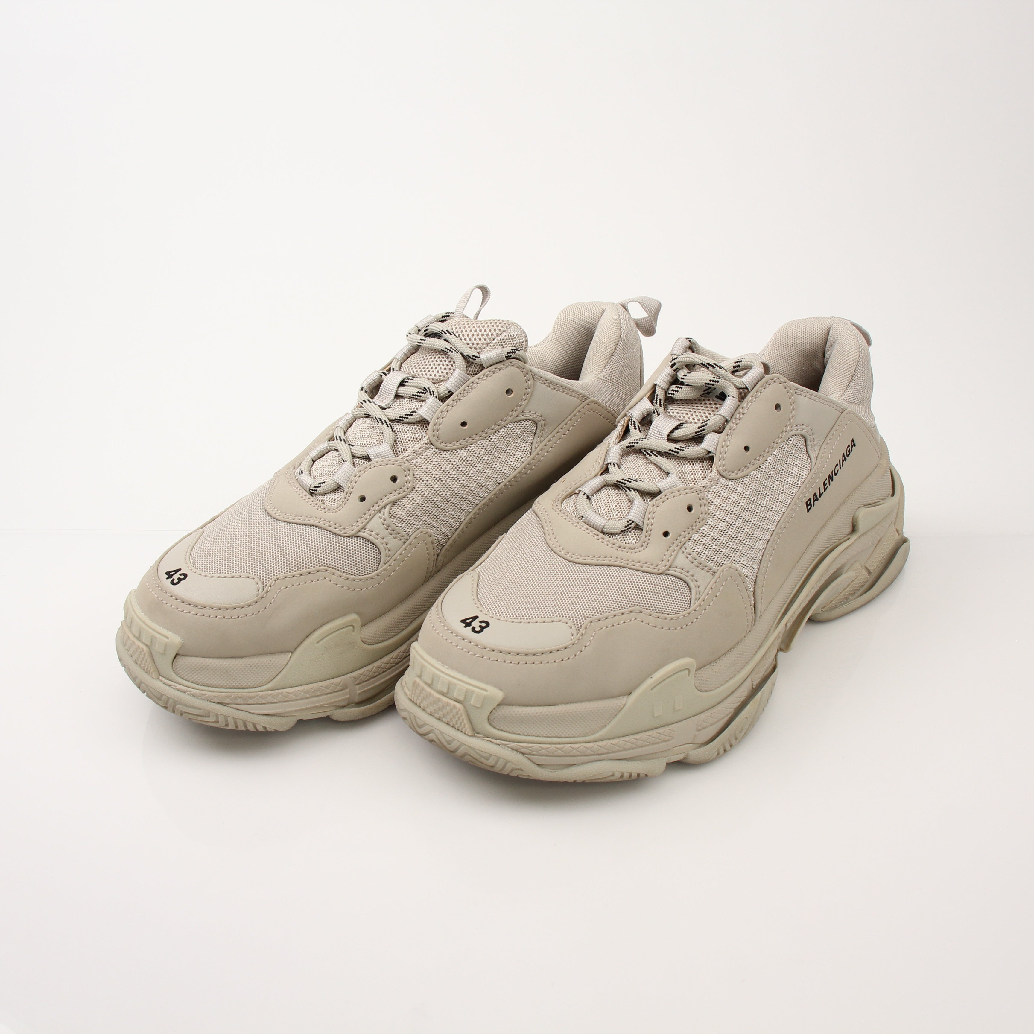 Gold & Beyond men's Balenciaga Triple S sneakers, stylish designer shoes with chunky sole and modern athletic design.