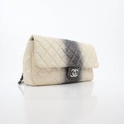 Chanel White and Black Ombre Jumbo Single Flap Handbag by Gold & Beyond with quilted leather and gold chain strap.