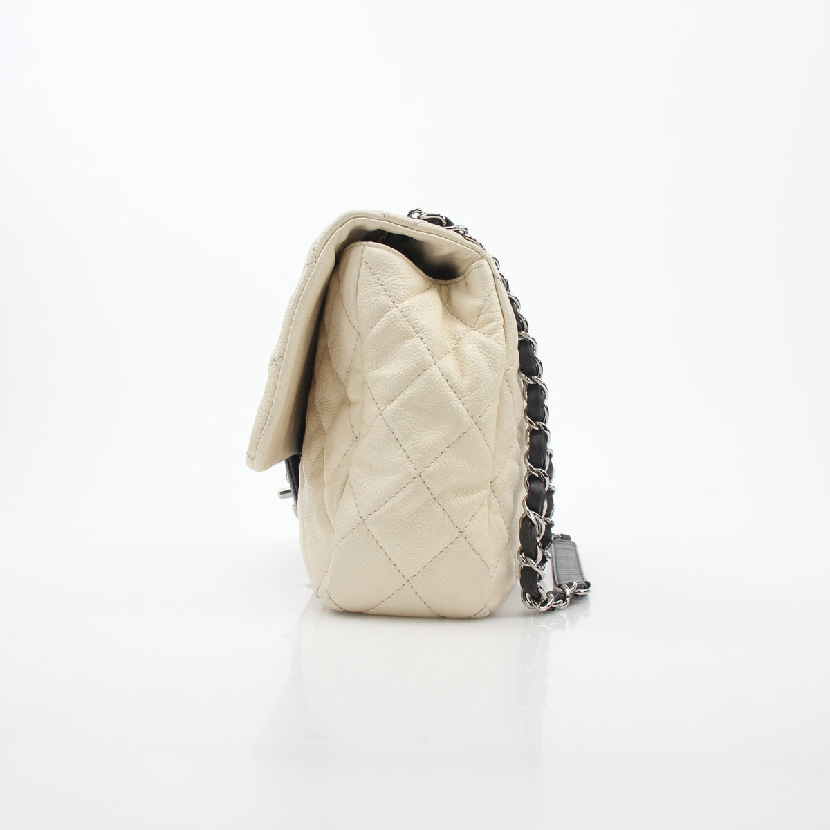 Gold & Beyond Chanel white and black ombre jumbo single flap handbag with gold hardware and quilted leather texture.