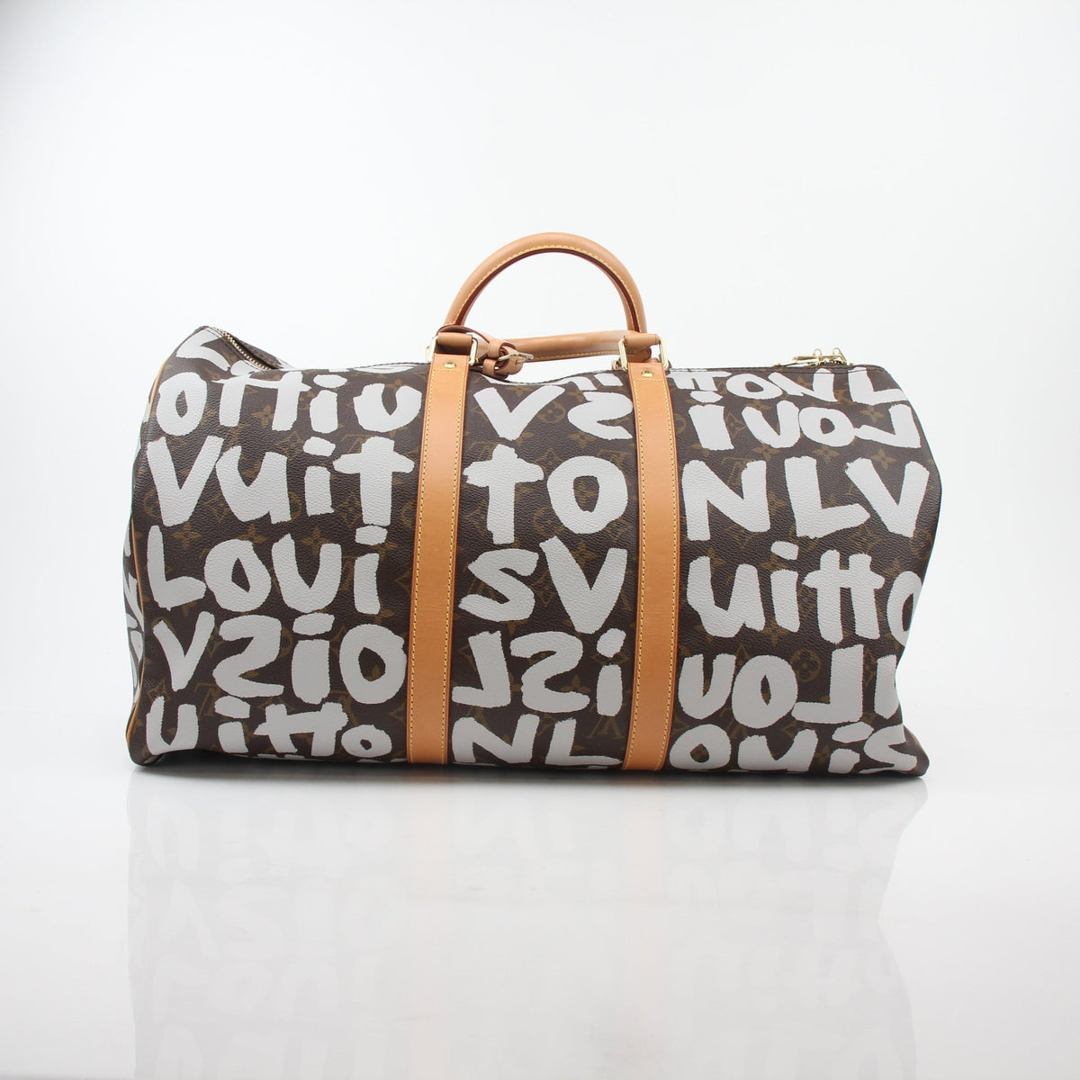 Louis Vuitton Brown Monogram Graffiti Keepall 50 travel bag with graffiti design and leather trim, crafted for stylish travel.