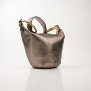 Gold & Beyond Chloé Nile bracelet metallic bucket handbag with chain strap and logo details, shown from a front view.