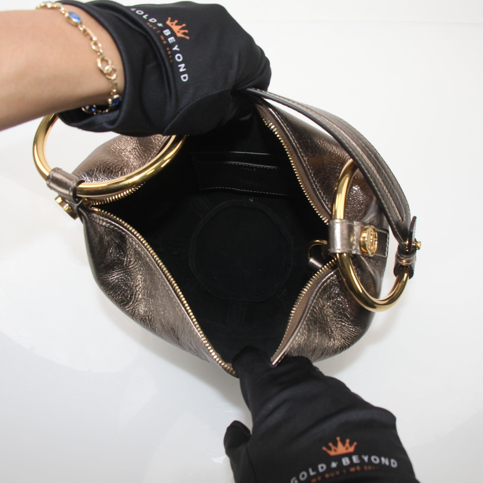 Gold & Beyond Chloé Nile bracelet metallic bucket bag handbag with chain strap and textured finish, stylish and compact.