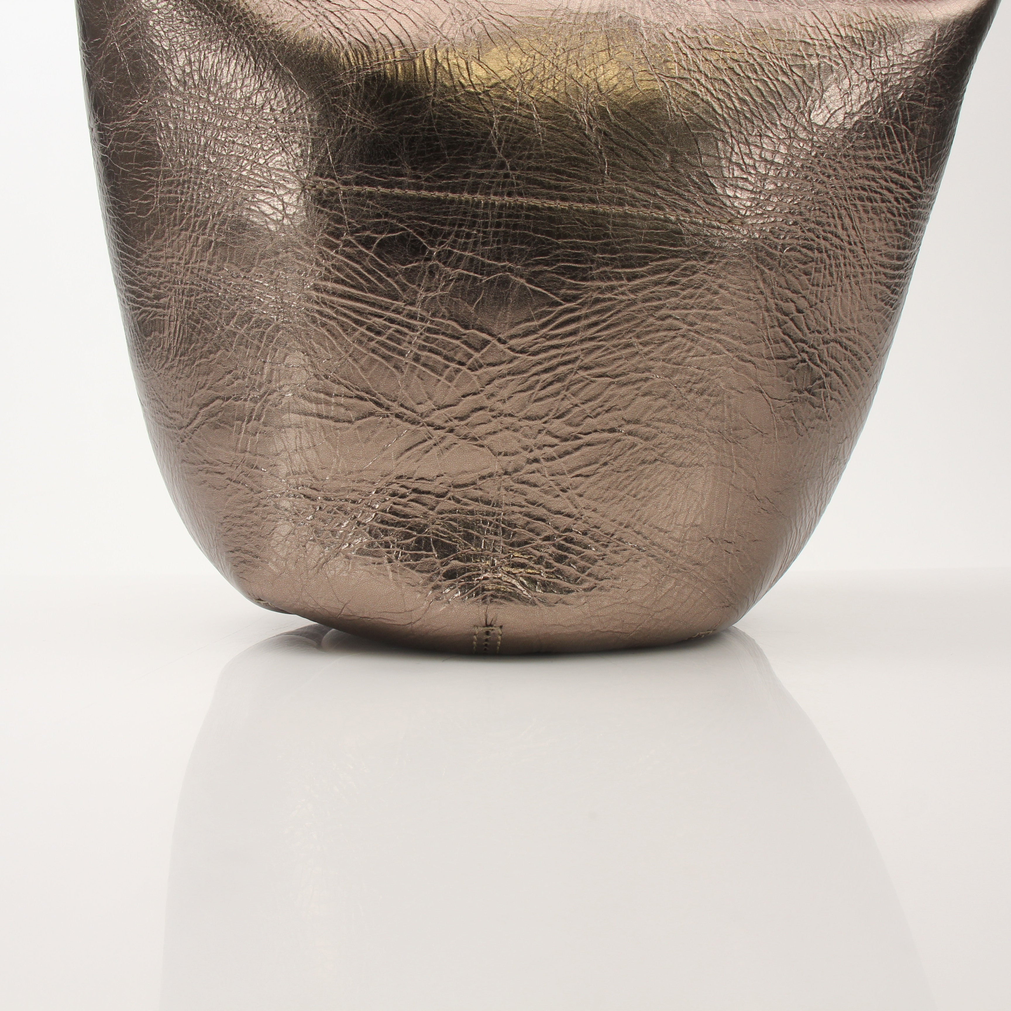 Gold & Beyond Chloé Nile metallic bracelet handbag with bucket bag design, featuring gold-toned hardware and textured surface.