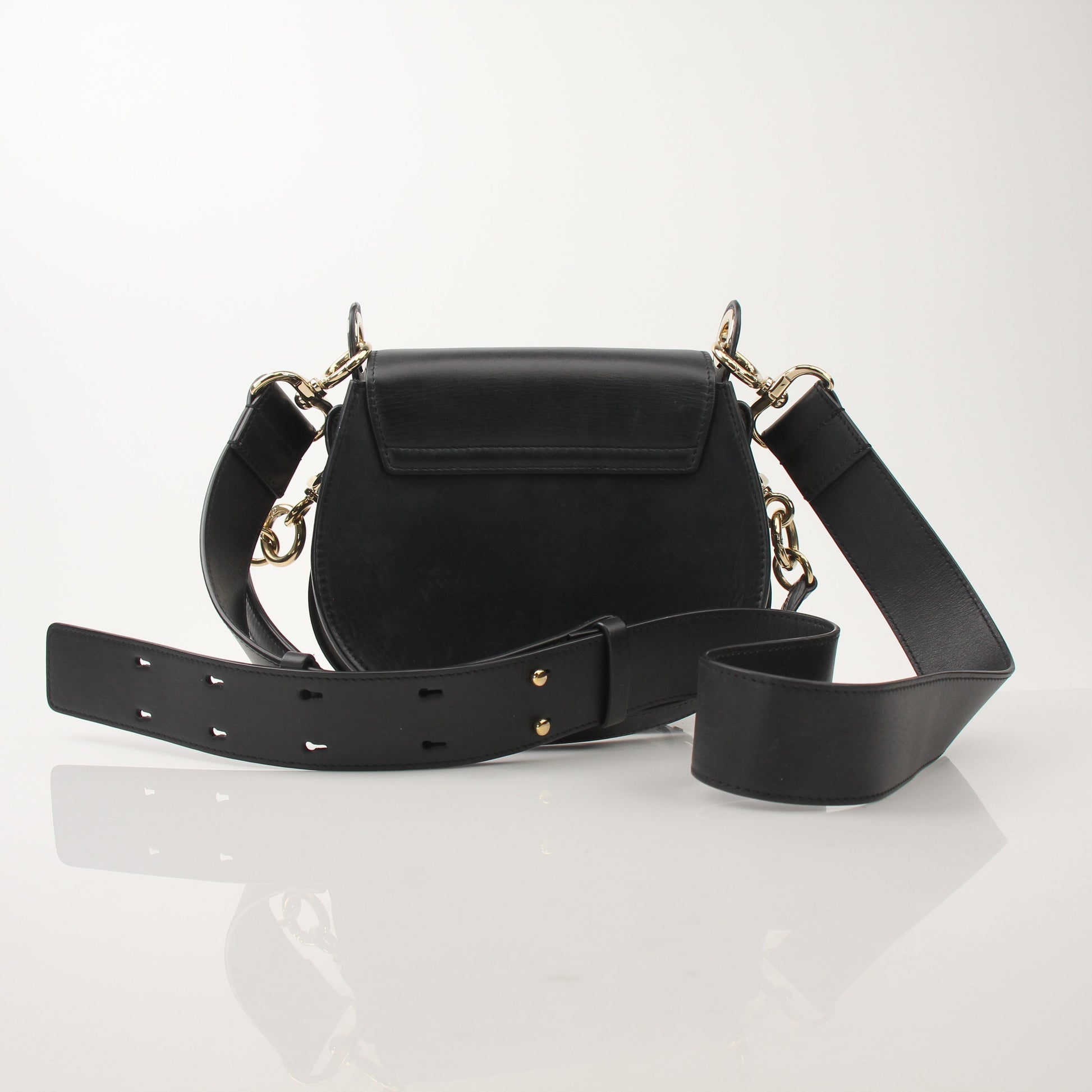 Gold & Beyond Chloé Tess Saddle Bag handbag with gold hardware and tan leather strap, showing front view and saddle design.