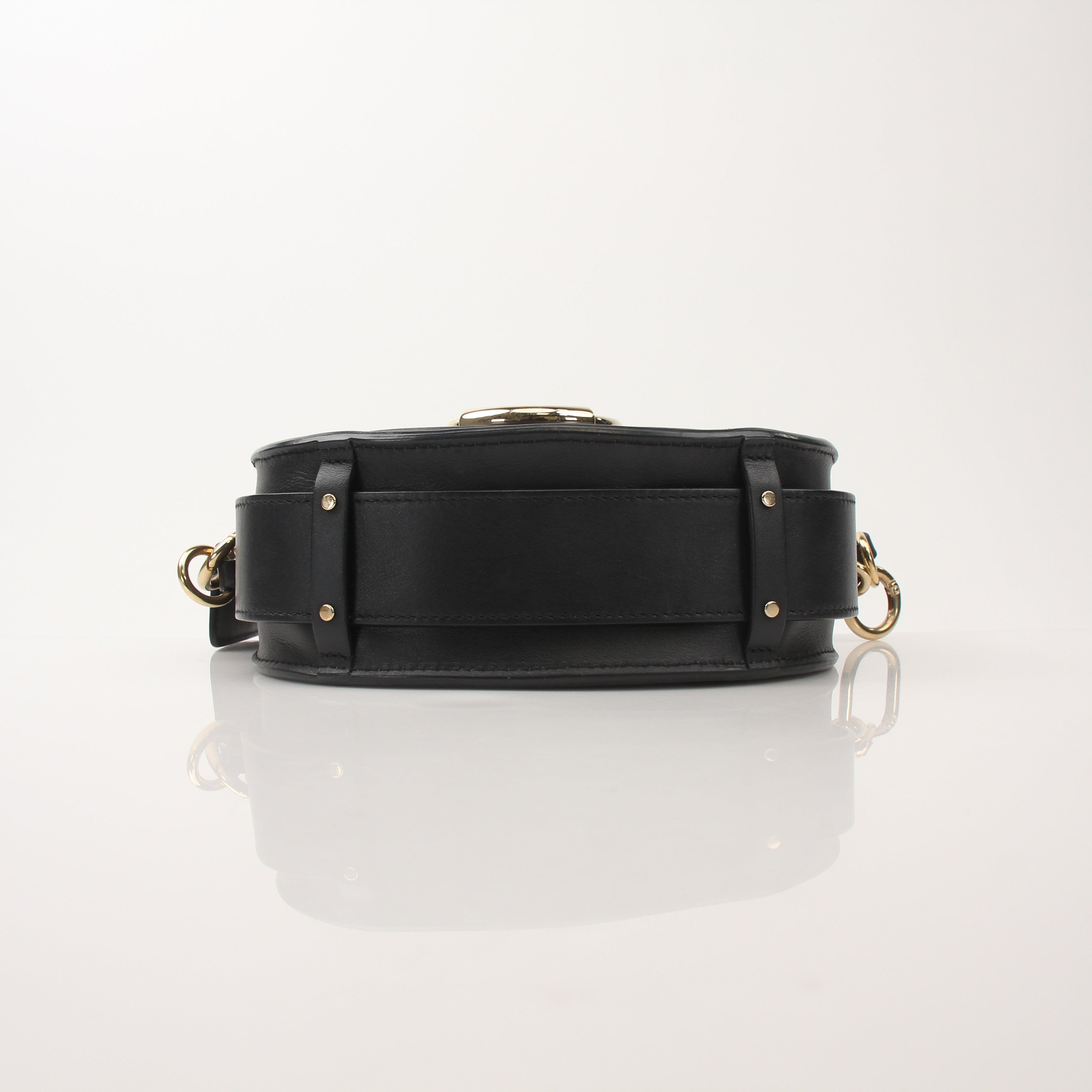 Gold & Beyond Chloé Tess Saddle Bag handbag with tan leather and saddle design, featuring gold hardware and adjustable strap.
