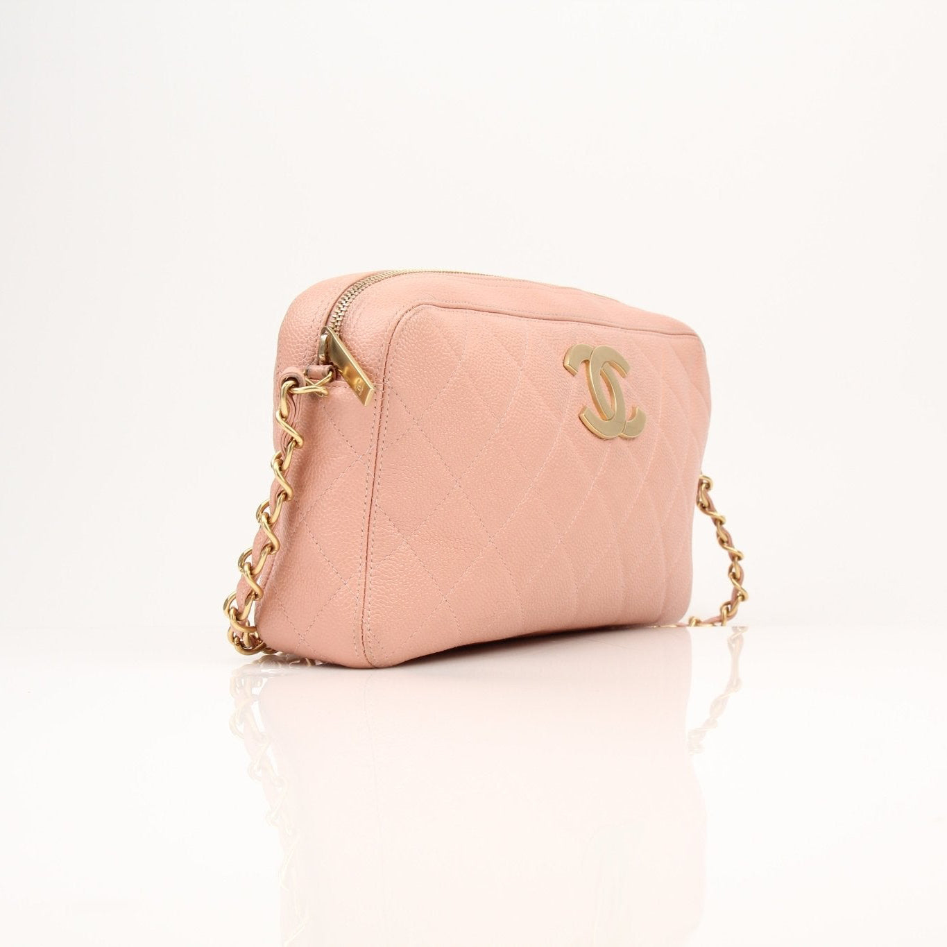 Pink Chanel Caviar Classic CC handbag with gold hardware from Gold & Beyond, showing textured leather and elegant design.