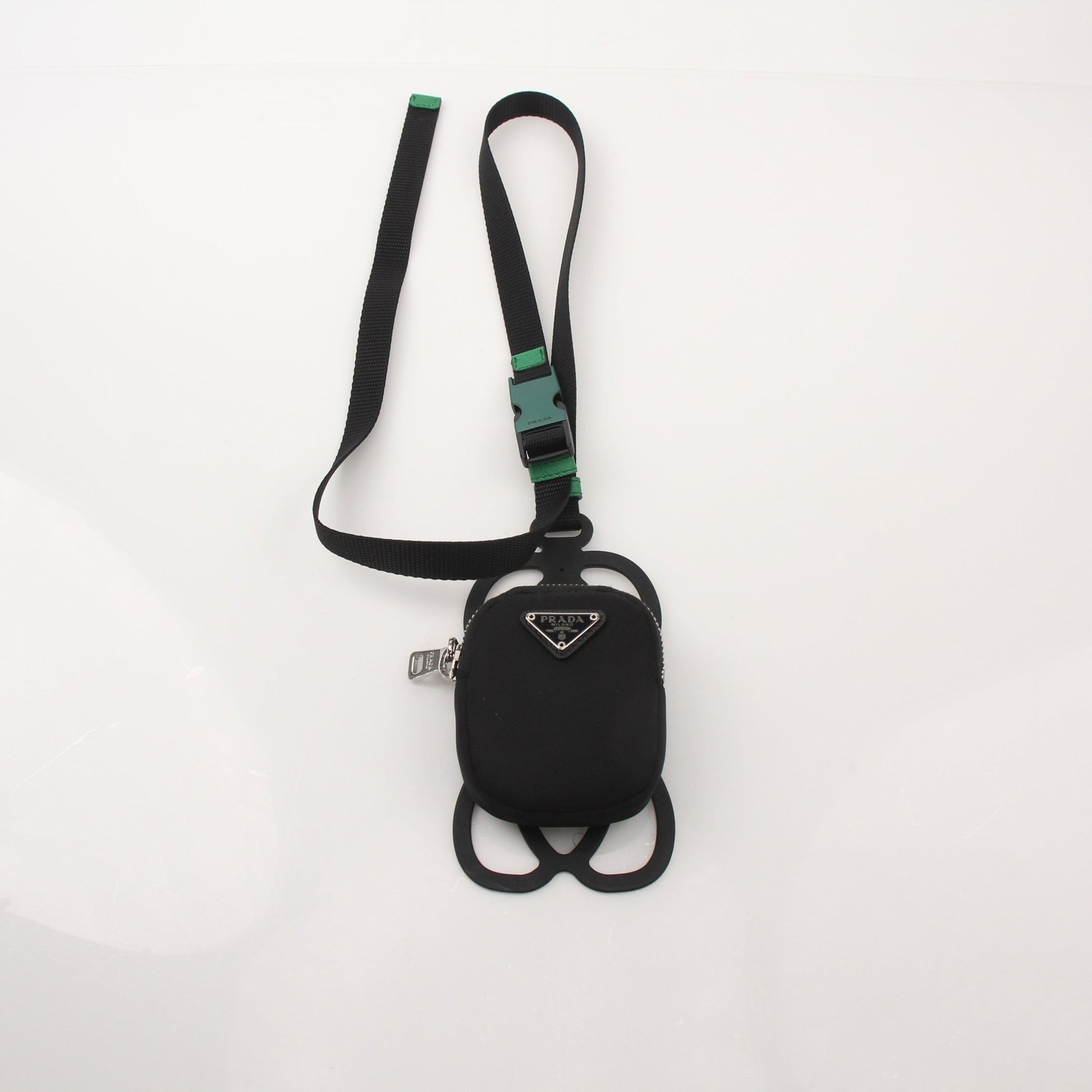Gold & Beyond Prada Mini Nylon Pouch with Smartphone Holder, compact accessories bag in black nylon with gold accents.